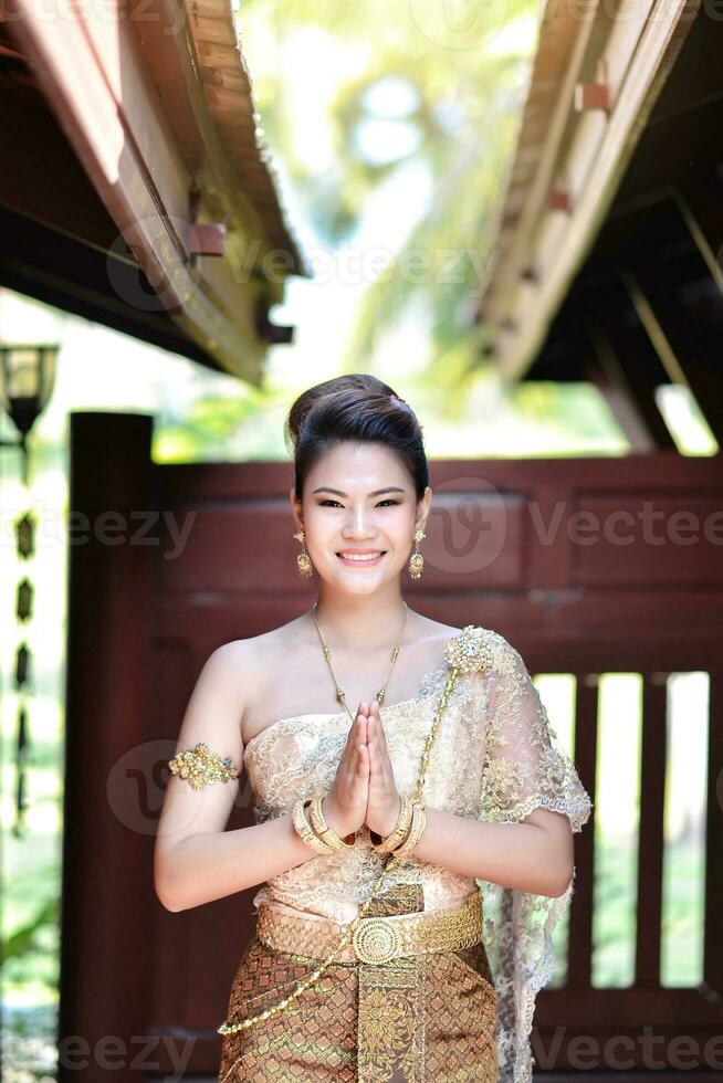 Beautiful Thai girl in Thai traditional costume photo