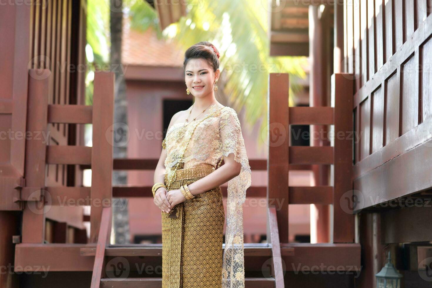 Beautiful Thai girl in Thai traditional costume photo