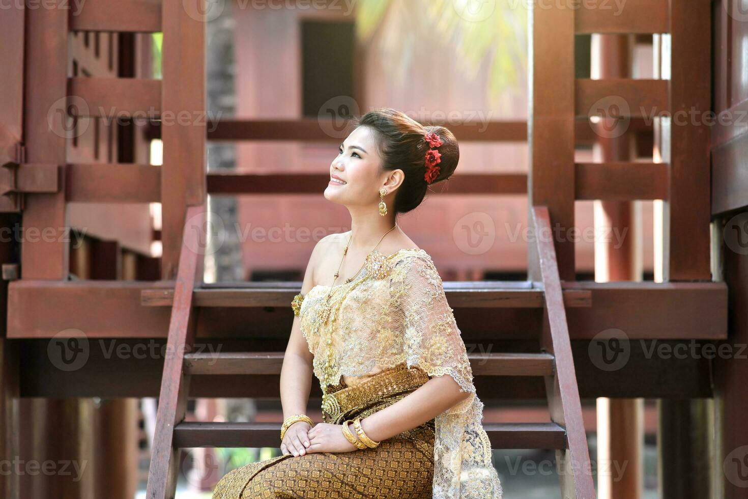 Beautiful Thai girl in Thai traditional costume photo