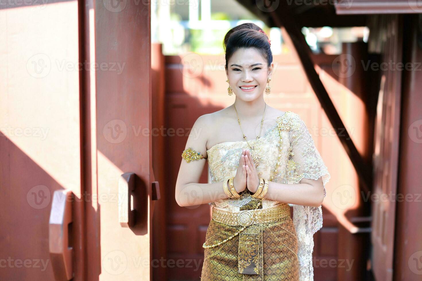 Beautiful Thai girl in Thai traditional costume photo