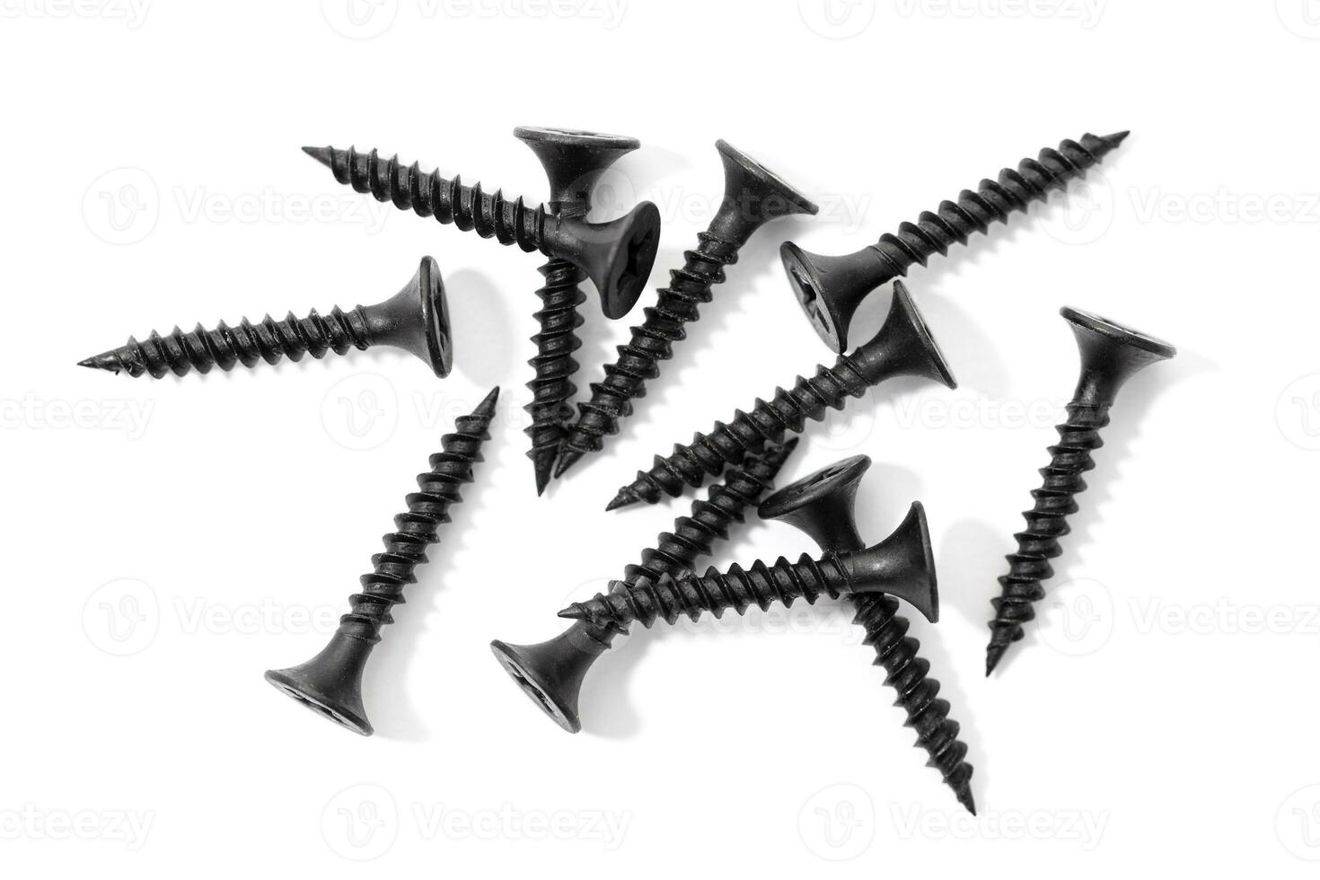 Group of Drywall screws isolated on white background photo