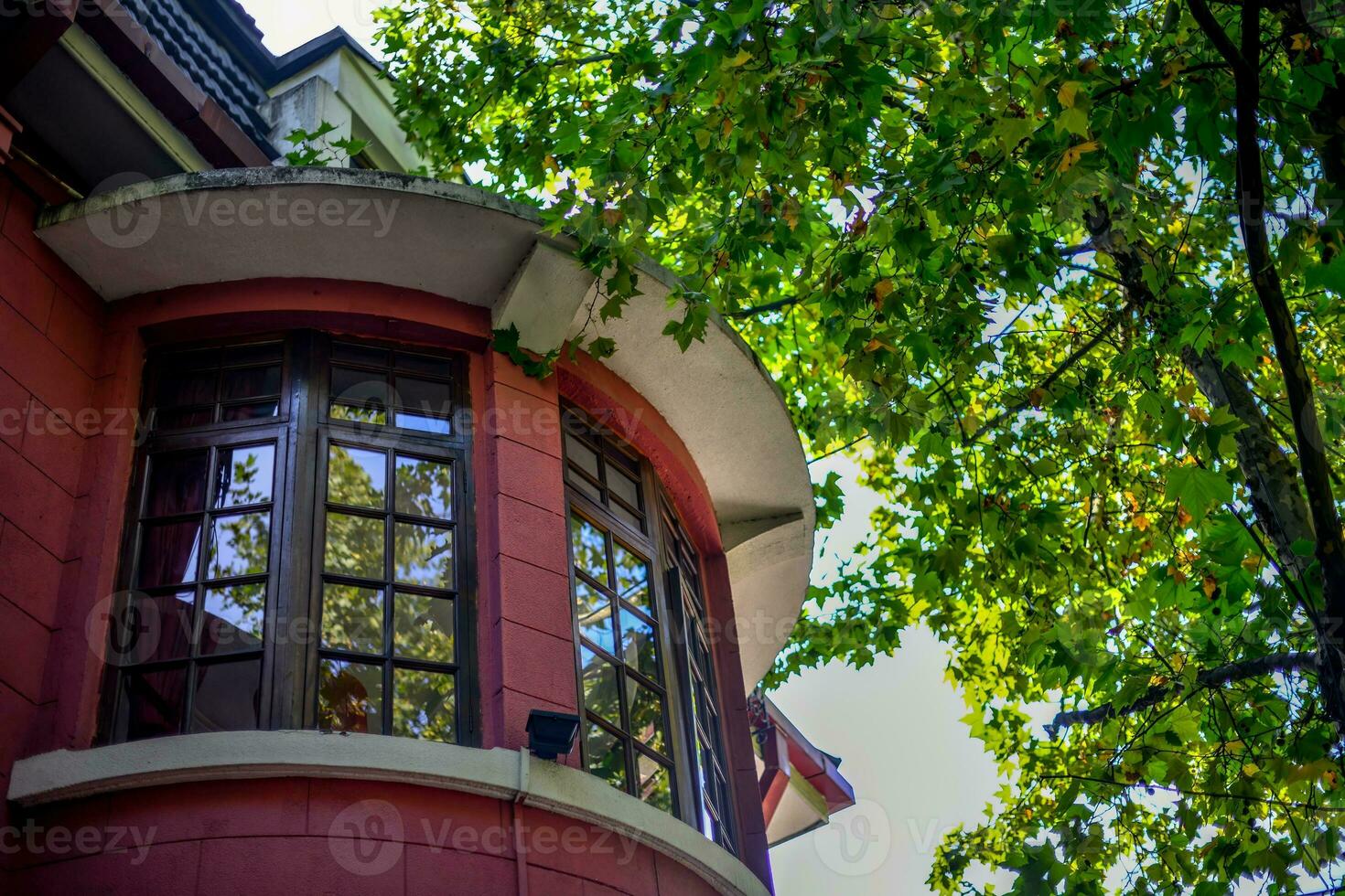 Many European buildings from the Concession era still remain on many old streets in Shanghai photo