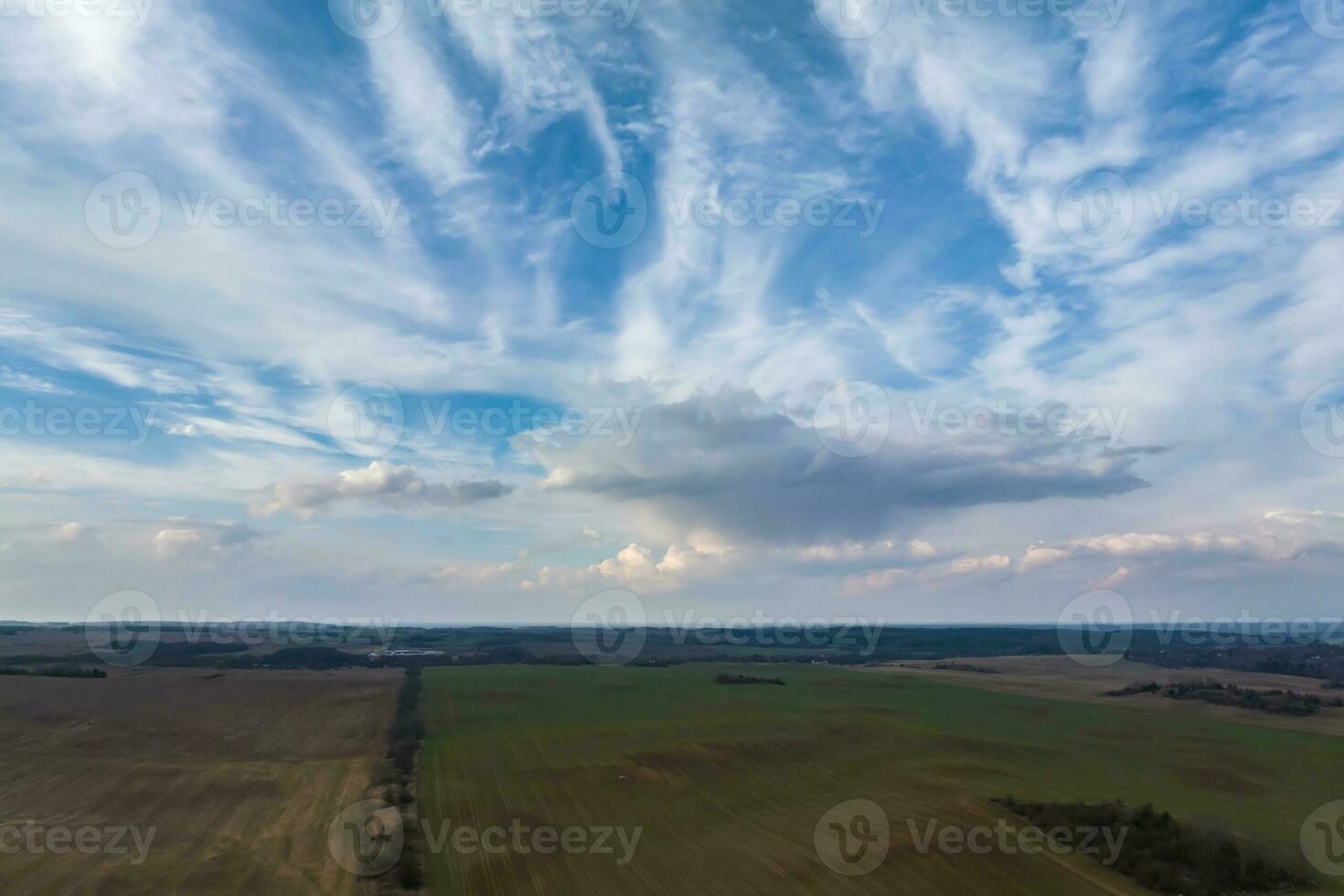 blue sky background with white striped clouds in heaven and infinity may use for sky replacement photo