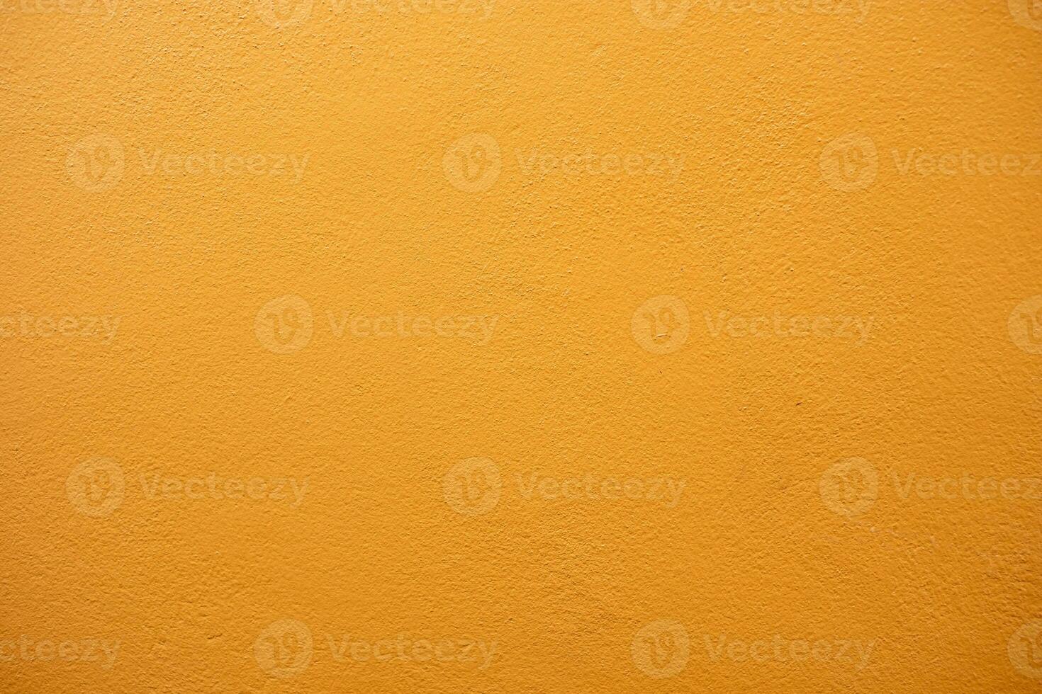 Orange cement wall background in vintage style for graphic design or wallpaper. Pattern of soft concrete floor in retro concept. photo