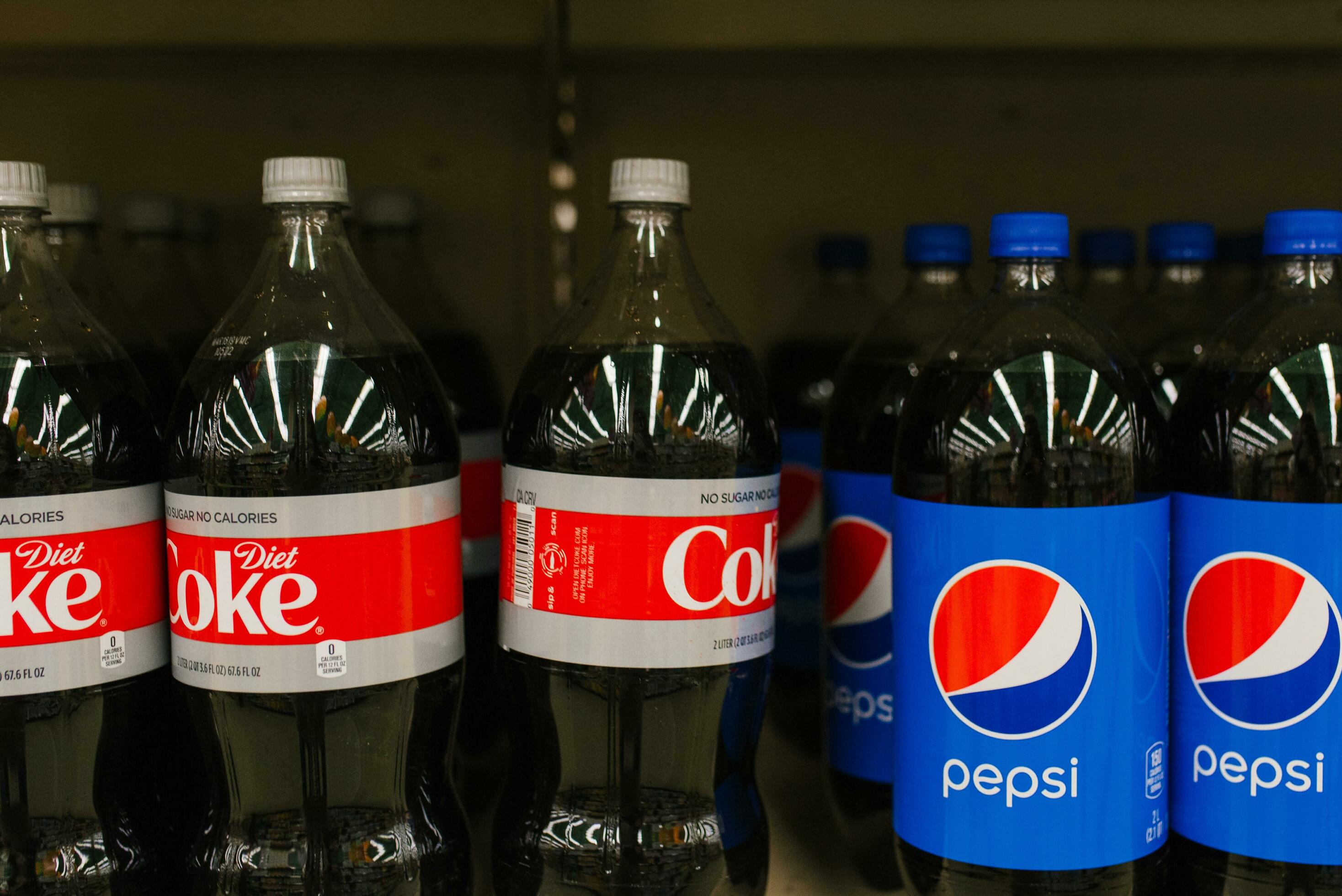 Seattle, Washington, USA. March 2020. Bottles of Coca Cola and Pepsi