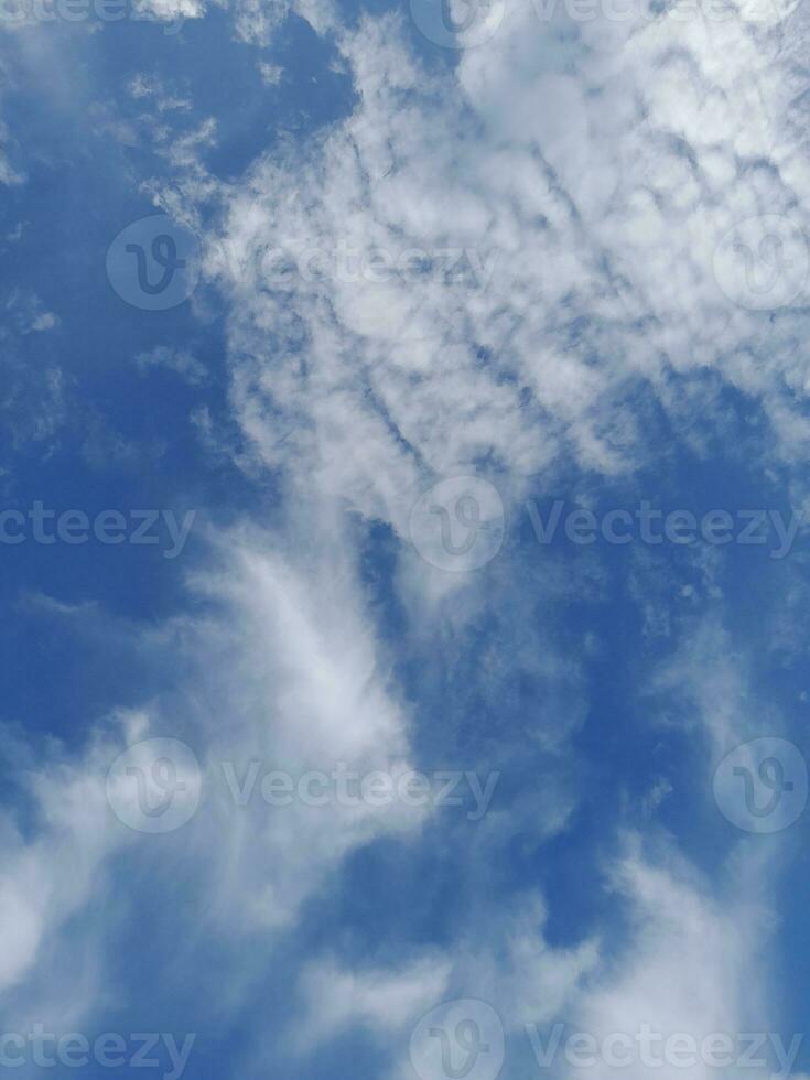 White clouds on the blue sky perfect for the background photo