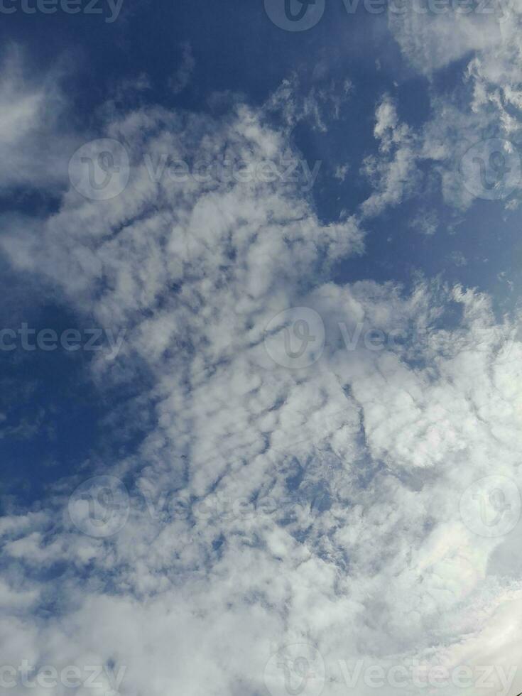 White clouds on the blue sky perfect for the background photo