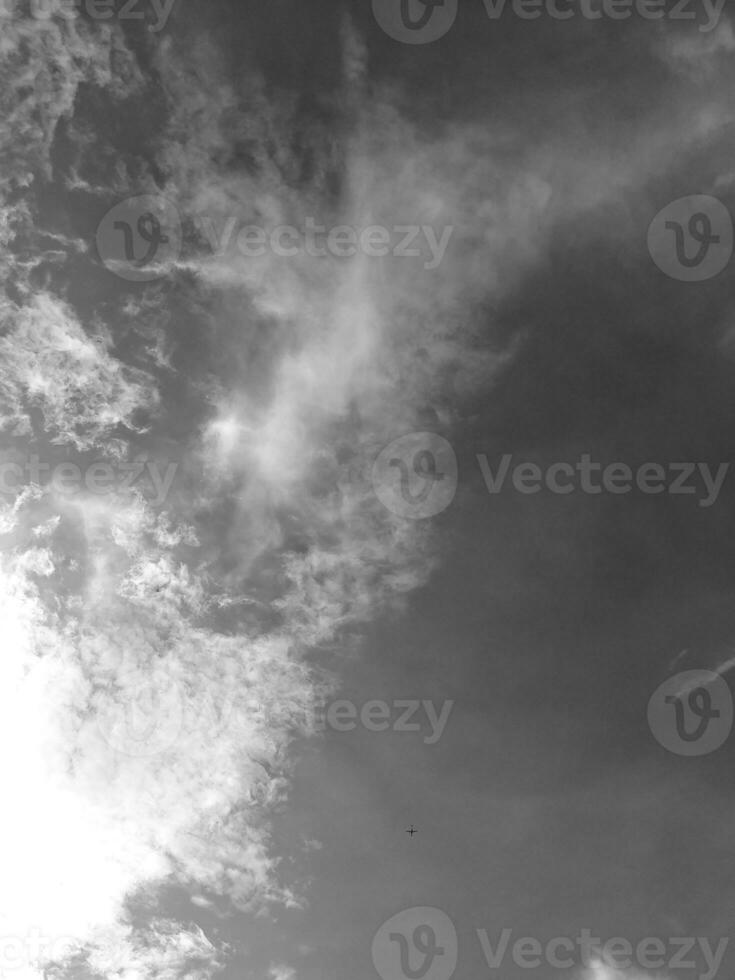 Beautiful grey clouds on sky background. Large bright soft fluffy clouds are cover the entire blue sky. photo