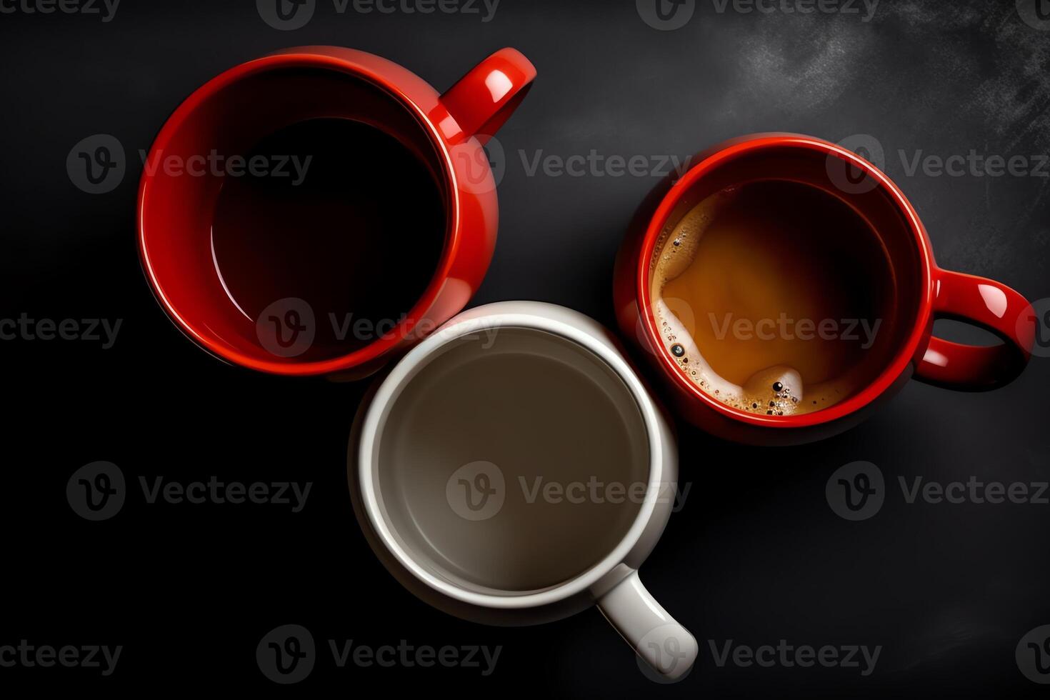Three coffee mugs white and red top down view. photo