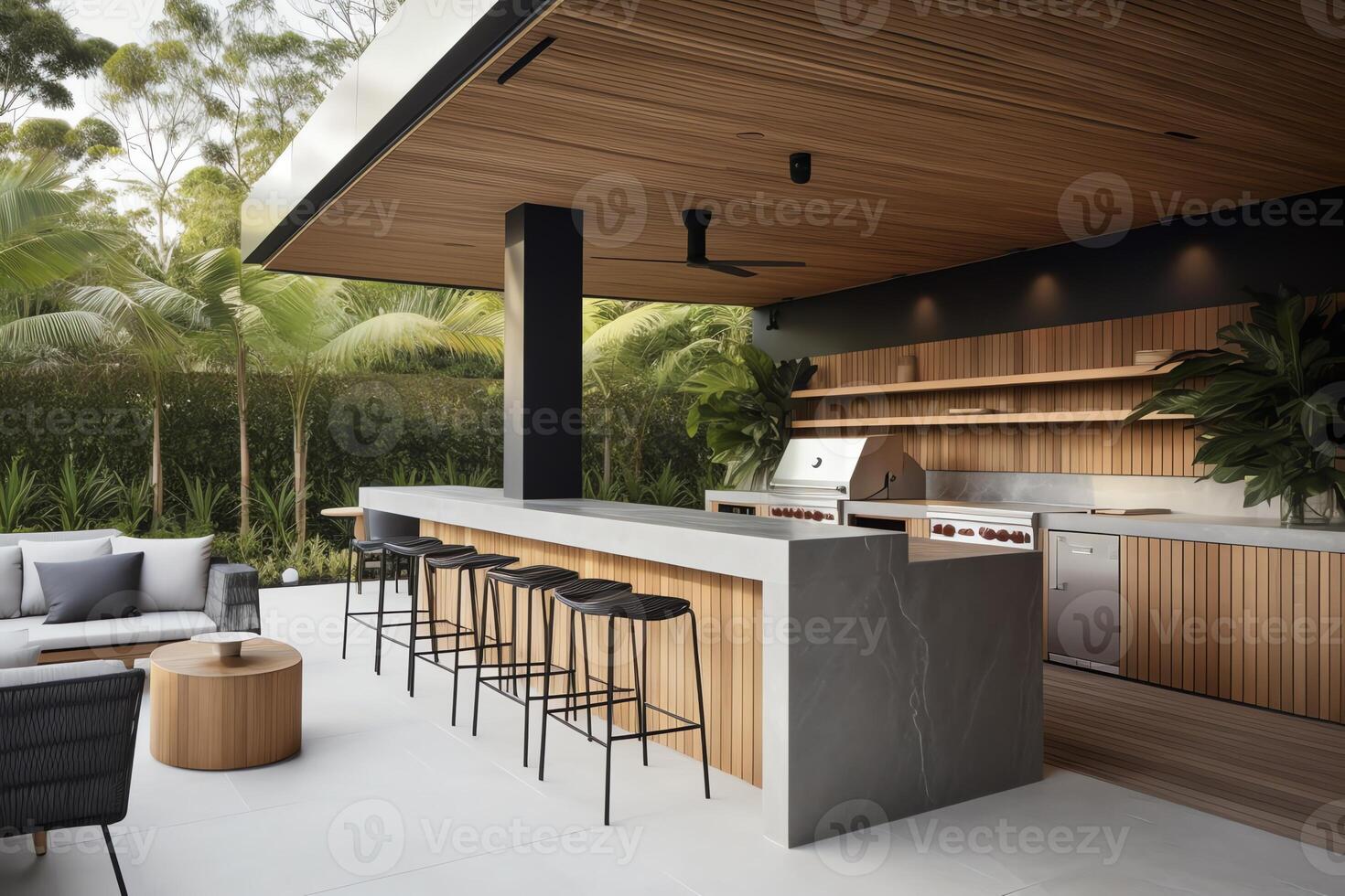 An outdoor entertainment area with a builtin barbecue and a bar setup. photo