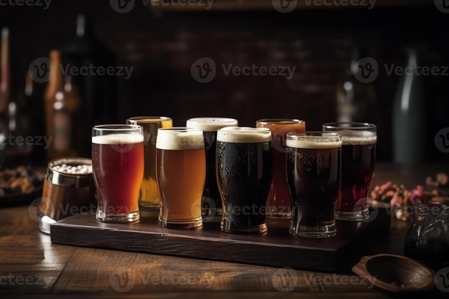 Different types of beer on the bar bar of the pub beer assortment cold different glasses of beer on the wooden table. photo