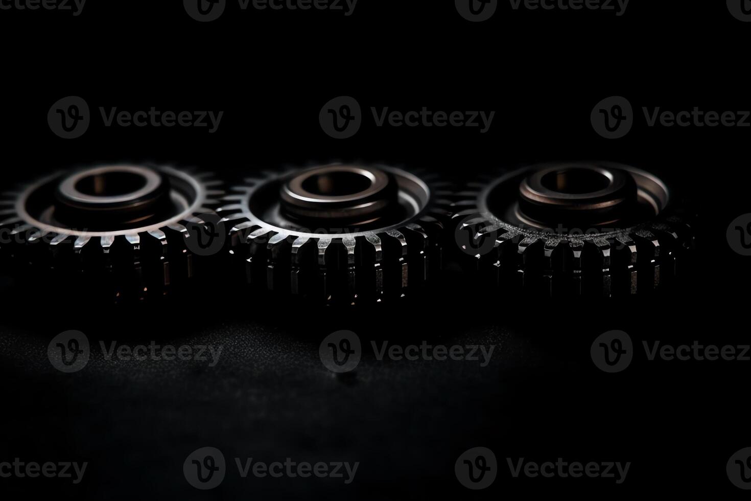 Two horizontal lines of the gear on a black background. photo