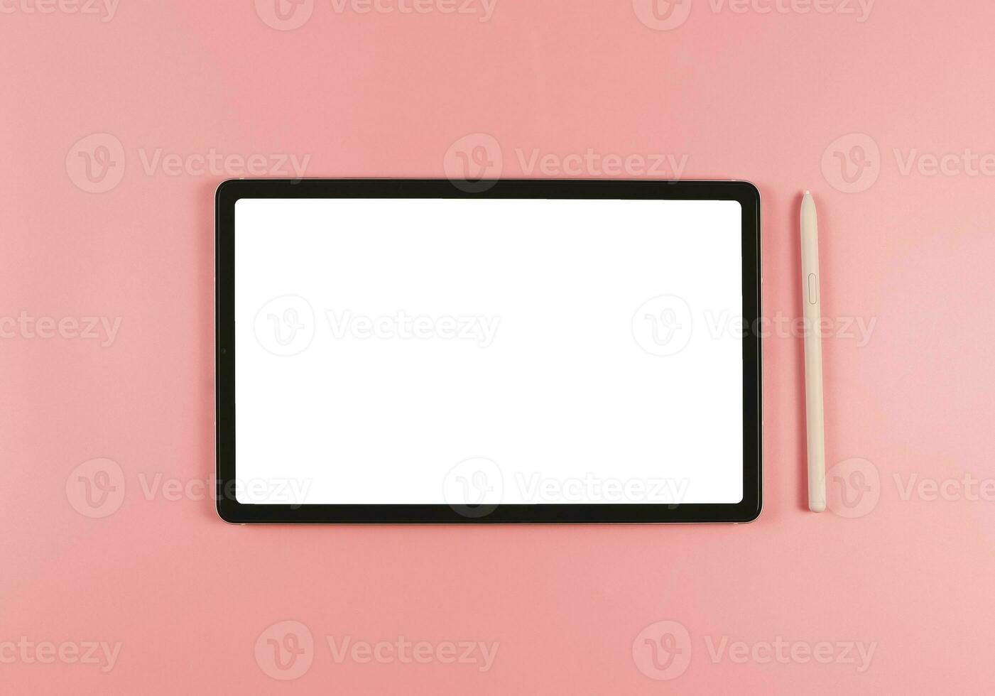 flat lay of digital tablet with blank white screen and pink stylus pen isolated on pink background. photo