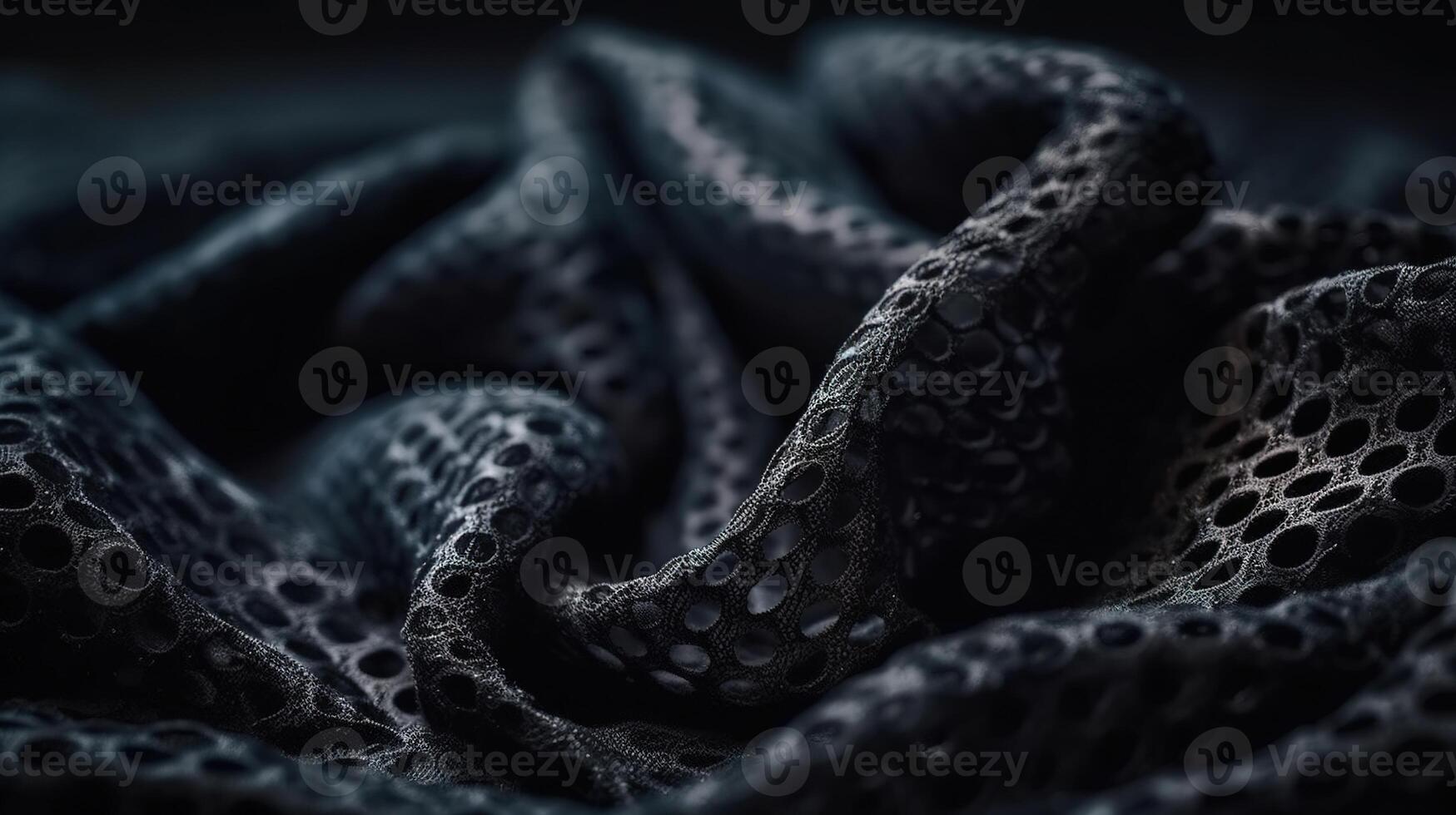 Black Fabric in Wavy Bokeh Abstract Background. photo