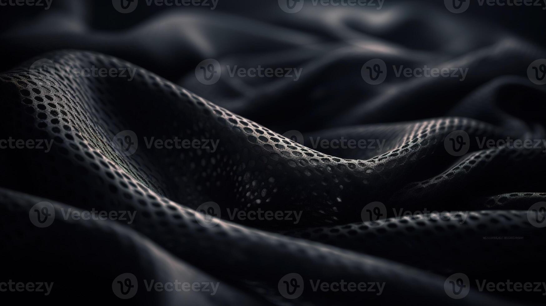 Black Fabric in Wavy Bokeh Abstract Background. photo