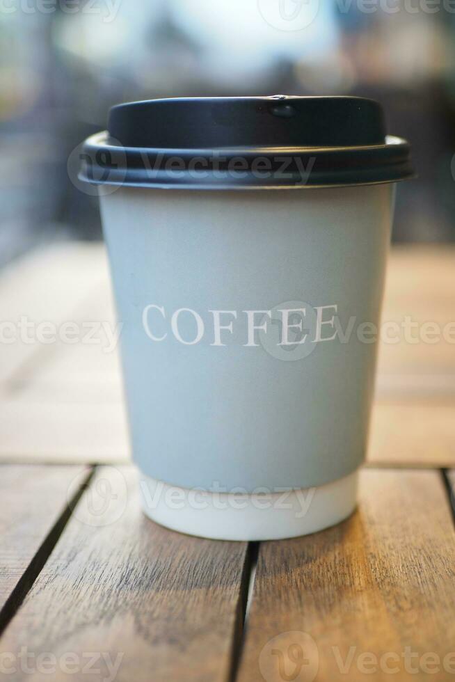 Blank take away kraft coffee cup on table , photo