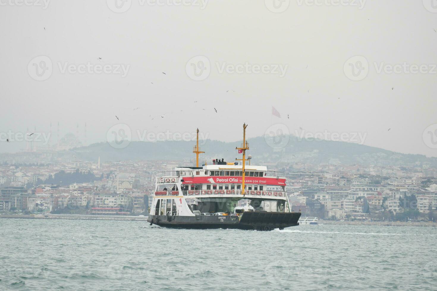 ISTANBUL, TURKEY 12 January 2023, ferryboat sail on the Bosphorus river photo