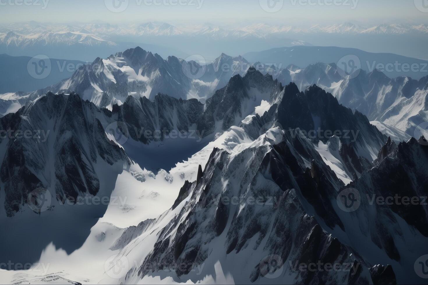 Snowy mountain range with icy peaks. photo