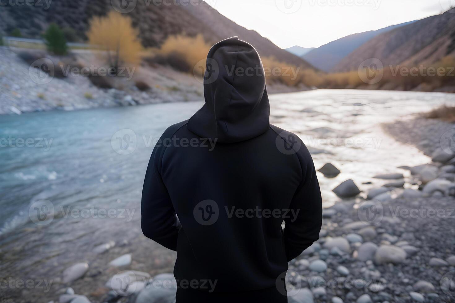 content, a man in a black sweatshirt in nature. back mockup for logo, t-shirt design photo