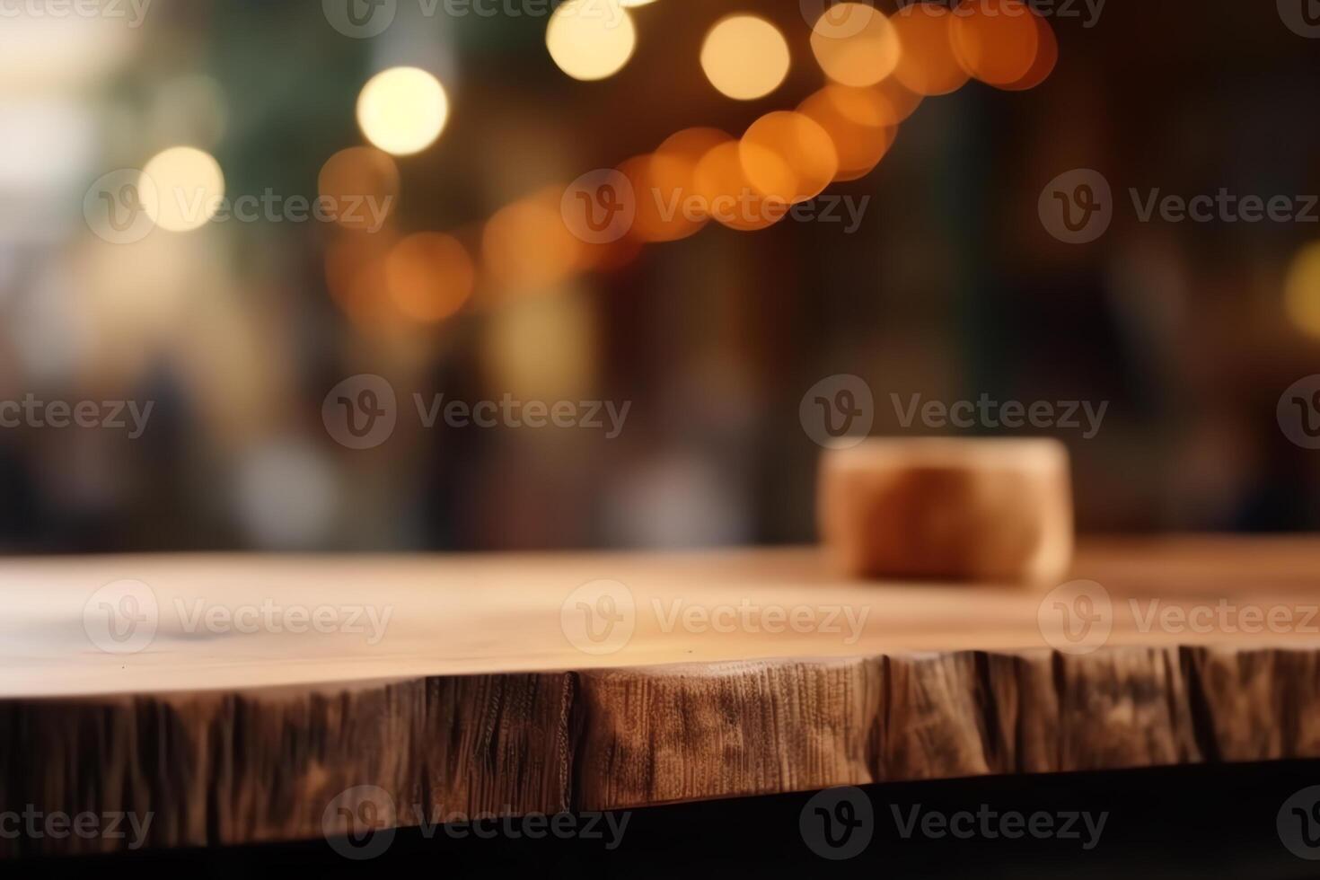 Empty wooden table in front of abstract blurred background product display in a coffee shop local market or bar. photo