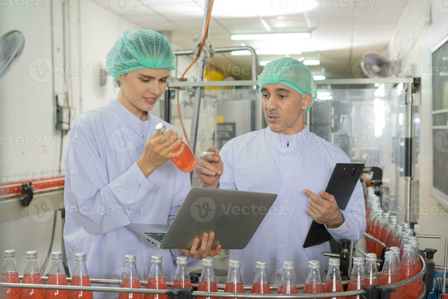 quality supervisor food or beverages technician inspection about quality control food or beverages before send product to the customer. Production leader recheck ingredient and productivity. photo