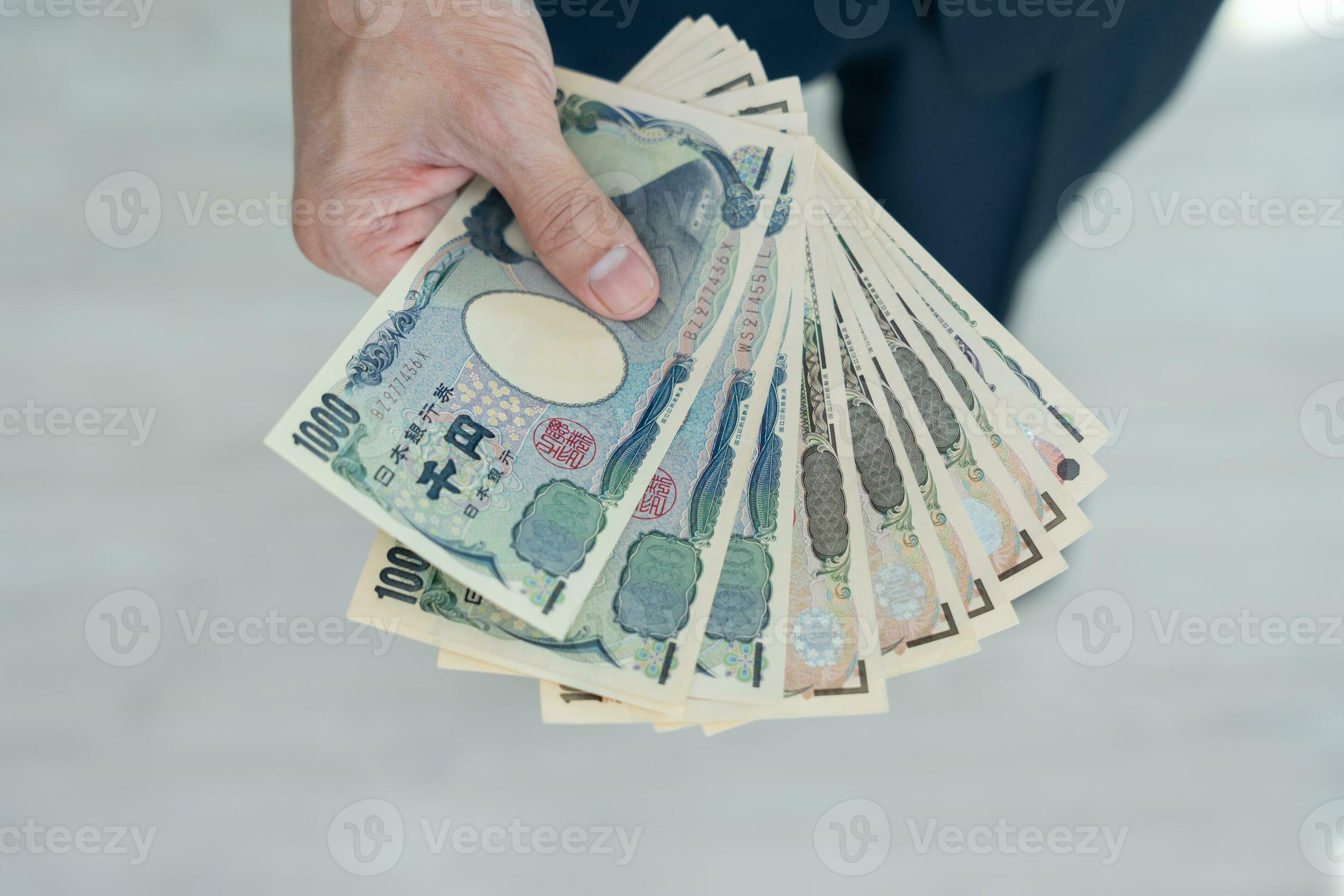 Japanese Yen money. close up of the Japanese yen on hand. currency of