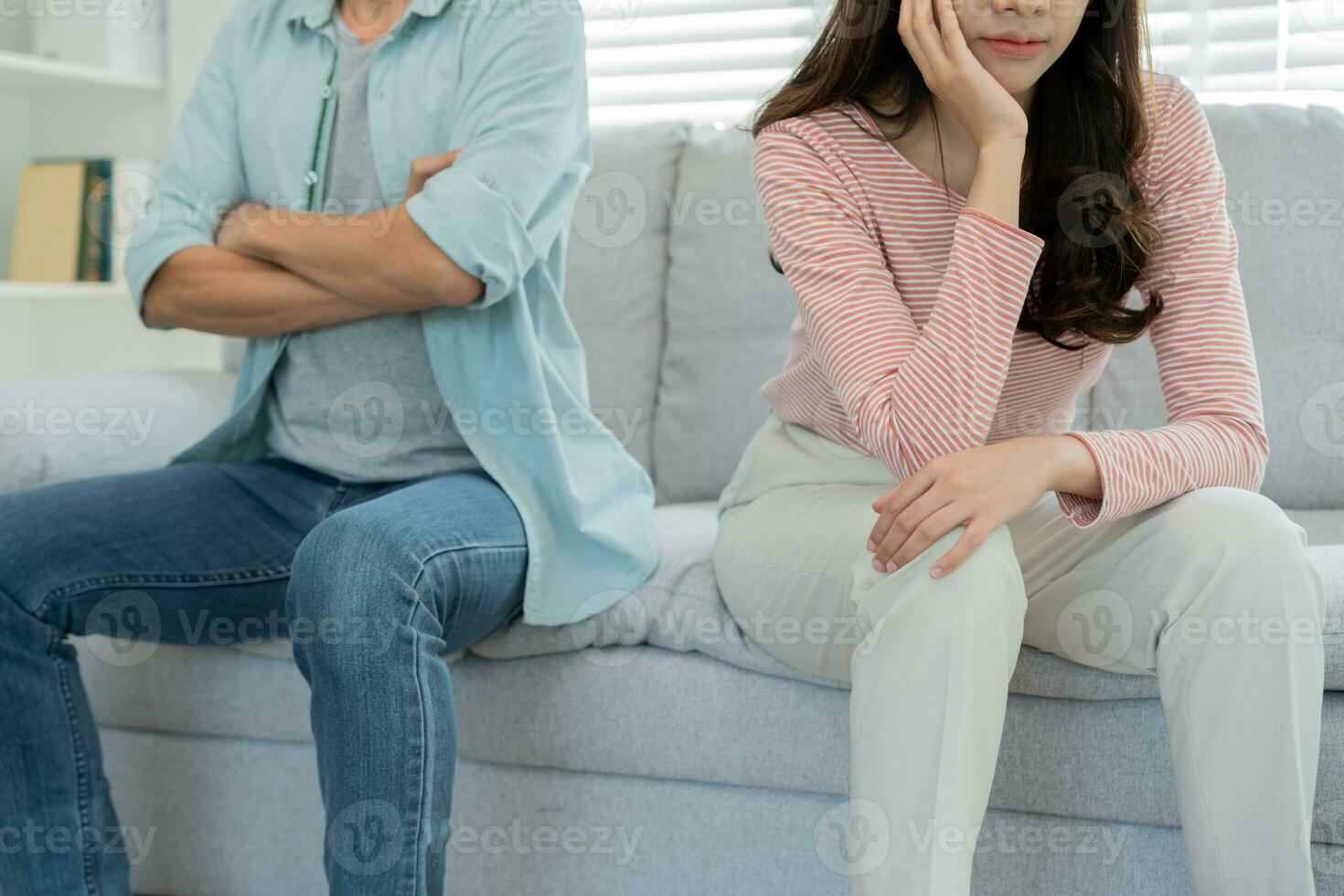 Divorce. Asian couples are desperate and disappointed after marriage. Husband and wife are sad, upset and frustrated after quarrels. distrust, love problems, betrayals. family problem, teenage love photo