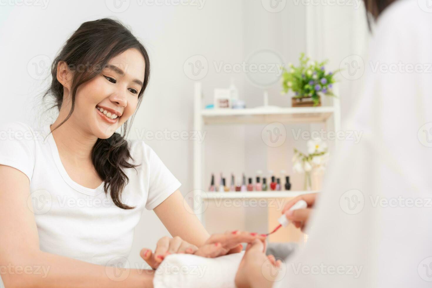Woman receive care service by professional Beautician Manicure at spa centre. Nail beauty salon use nail file for Glazing treatment. manicurist make nail customer to beautiful. body care spa treatment photo