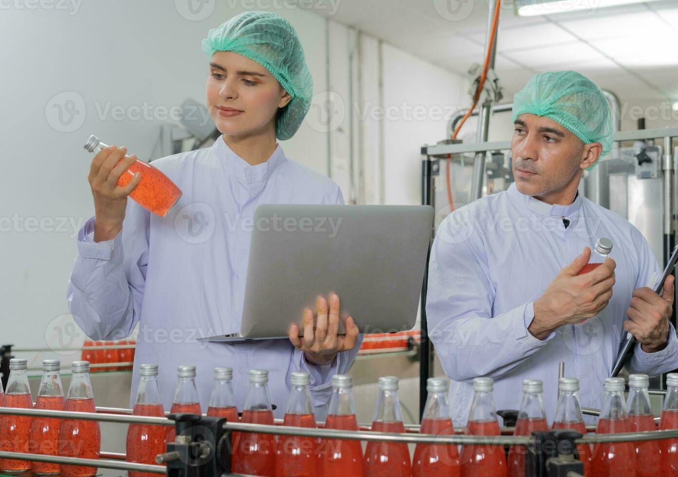 quality supervisor food or beverages technician inspection about quality control food or beverages before send product to the customer. Production leader recheck ingredient and productivity. photo