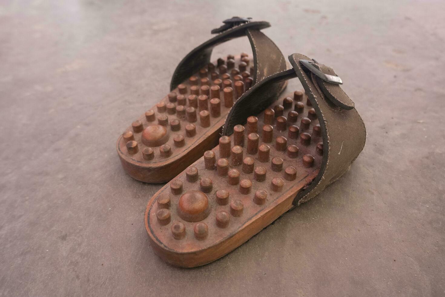 wooden health sandals, commonly used for the treatment of various diseases photo