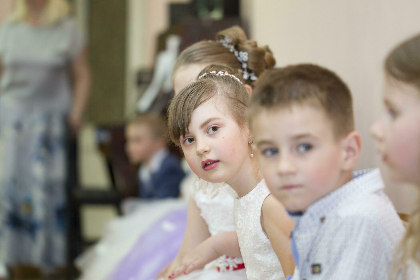 Belarus, Gomel, May 30, 2019. An open day in a kindergarten. The girl's face on the day in kindergarten. photo