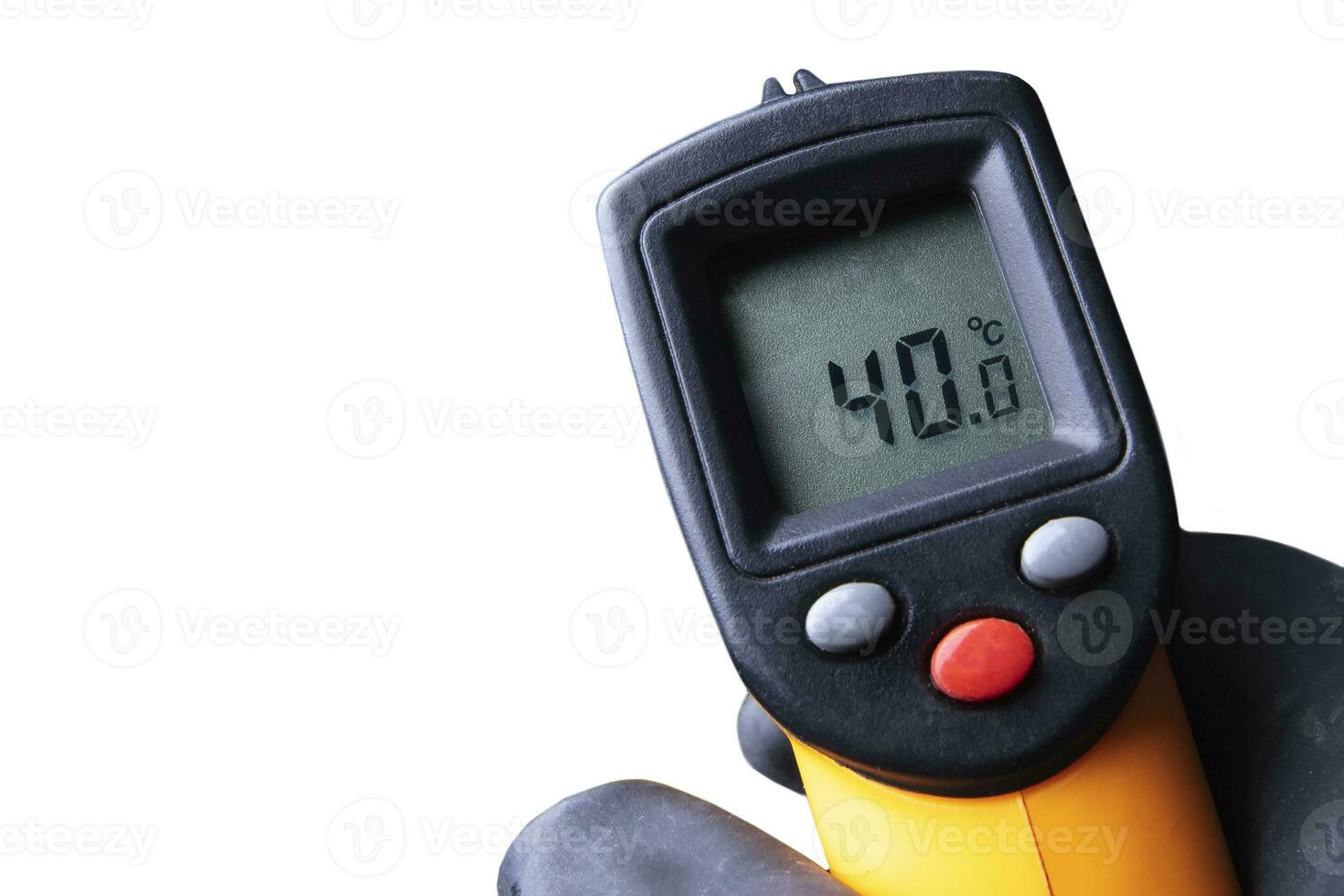 A man's hand in gloves holds an industrial thermometer. photo