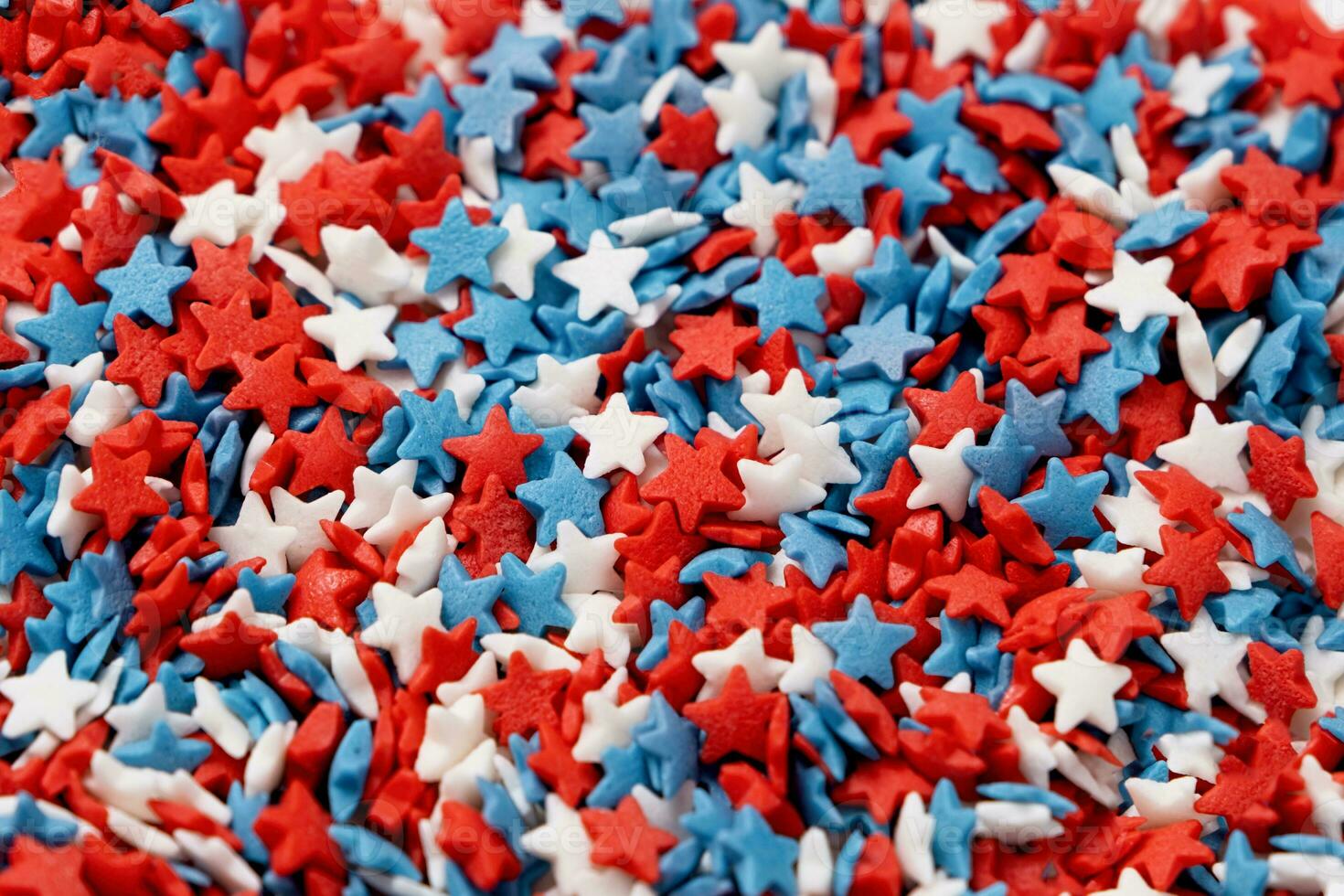 colorful star shape sprinkes decorations for fourth july texture photo