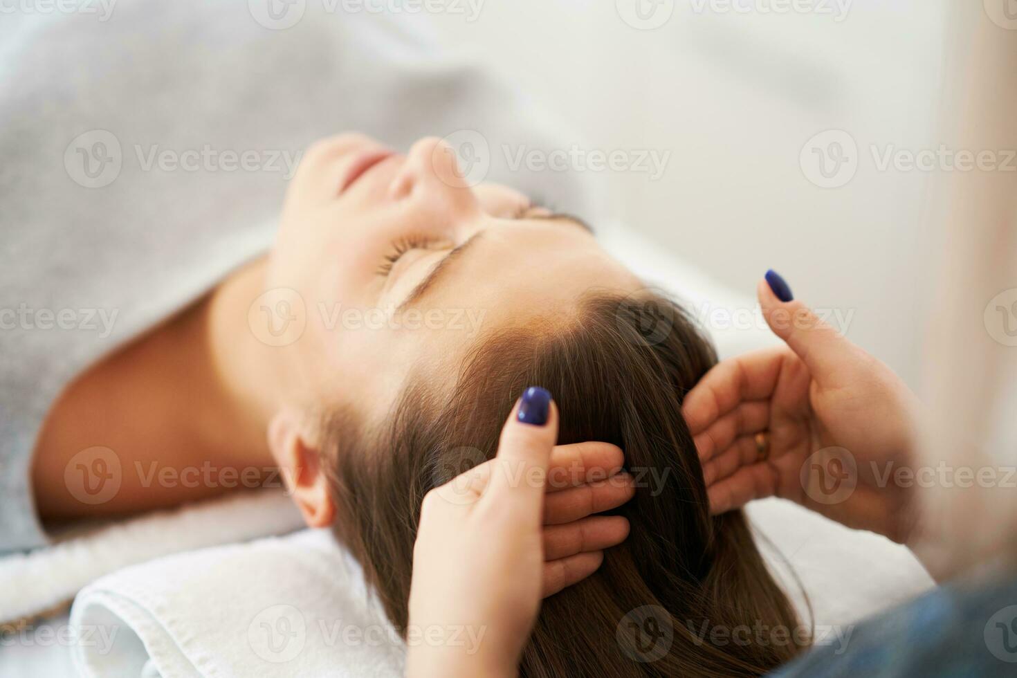 Picture of an treatment that involves gently touching 32 points on your head photo