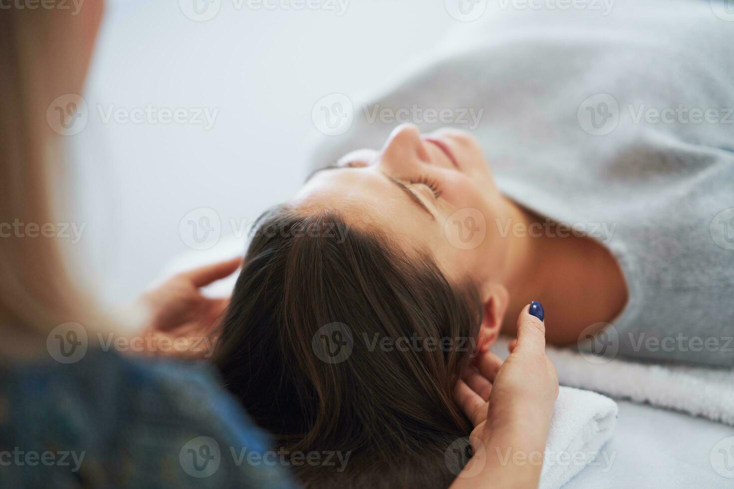 Picture of an treatment that involves gently touching 32 points on your head photo