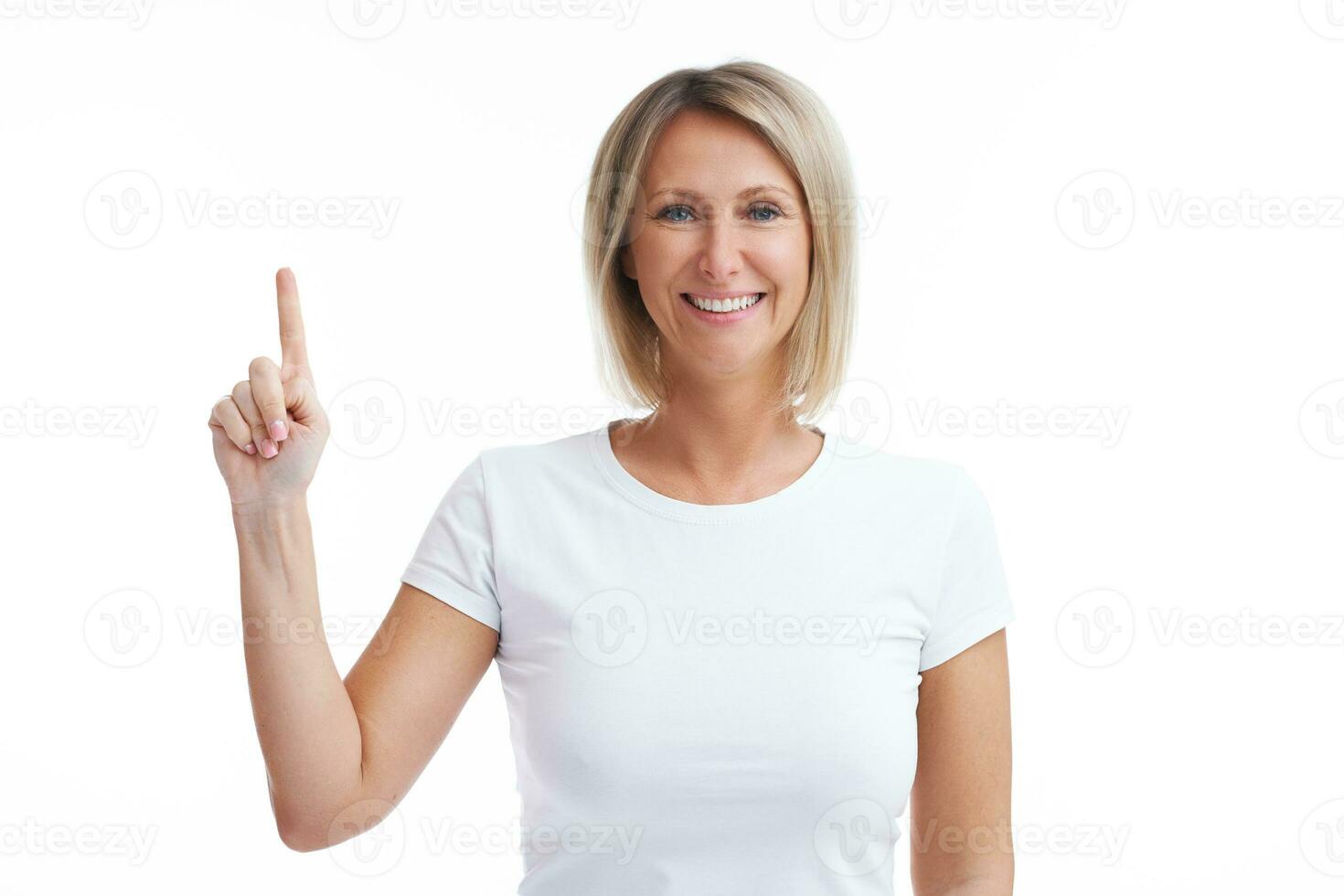 Picture of blonde woman over back isolated background counting on fingers photo
