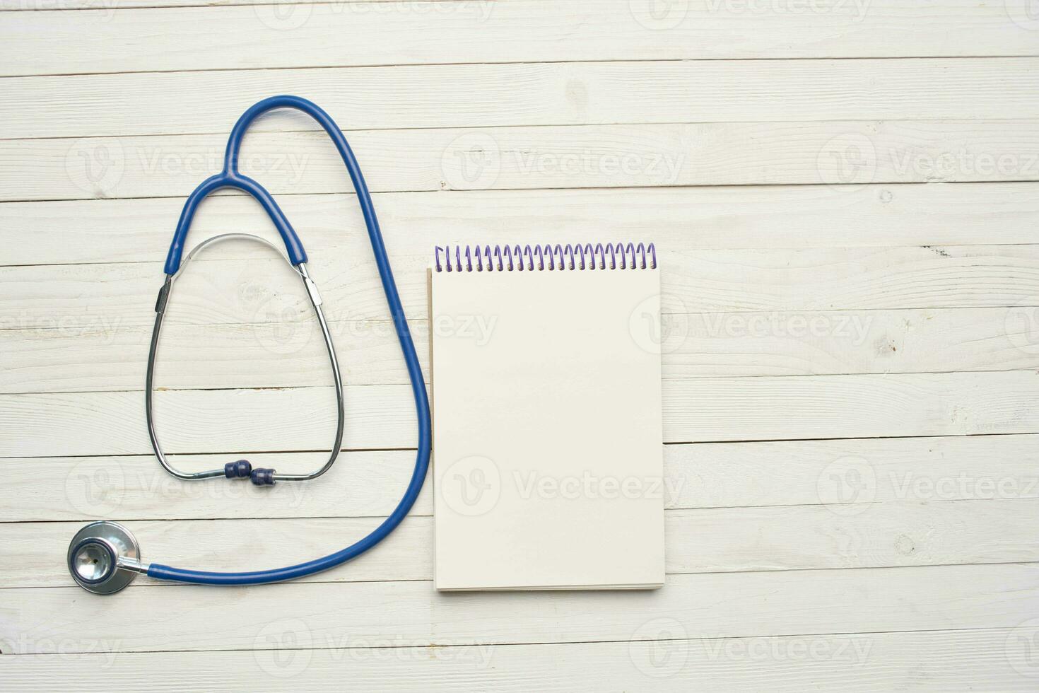 wooden background stethoscope notepad treatment medicine hospital photo