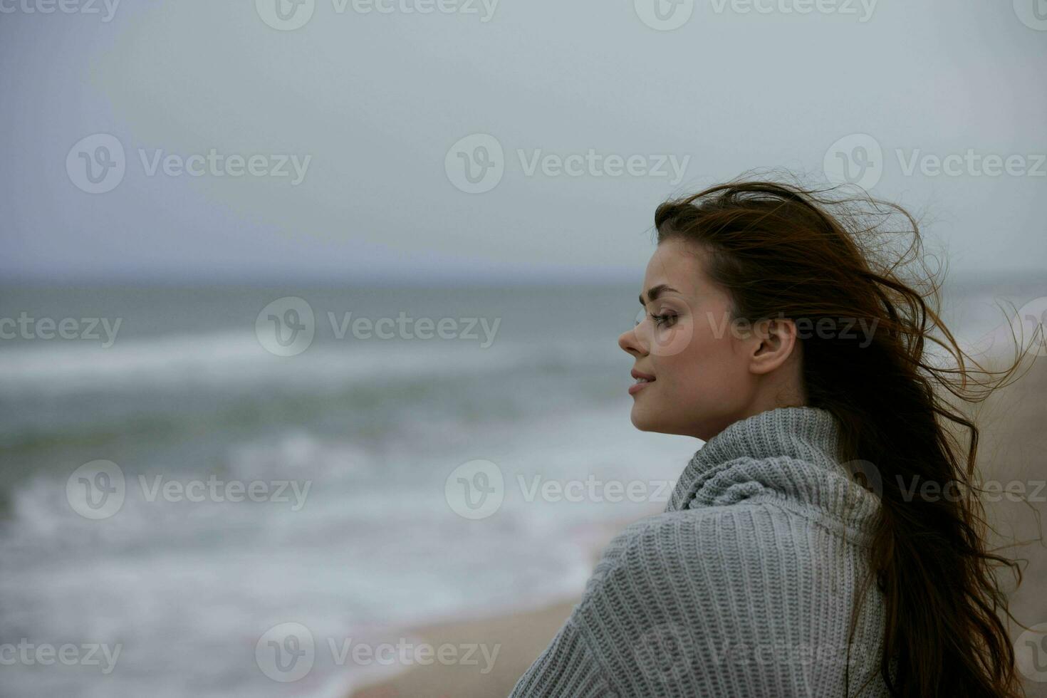 pretty woman cloudy weather by the sea travel fresh air Lifestyle photo