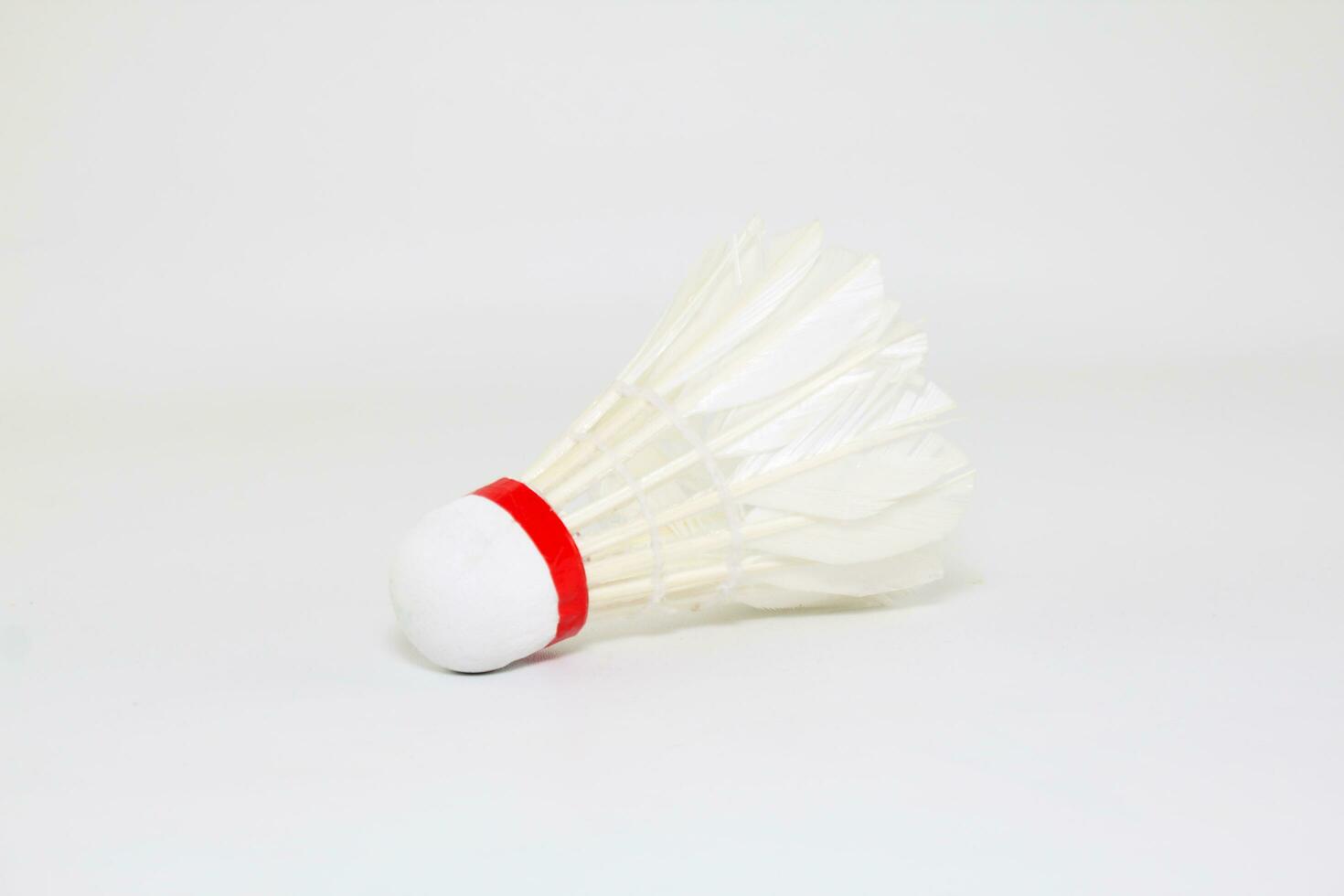 used shuttlecock Isolated on a White background photo