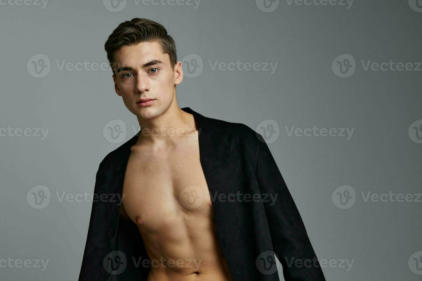 man in black jacket naked torso attractive look posing self-confidence photo