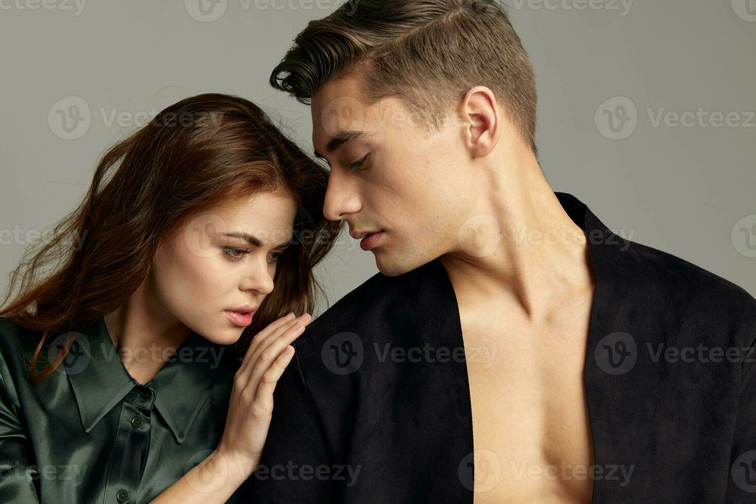 Cute young couple luxury charm seduction close-up photo