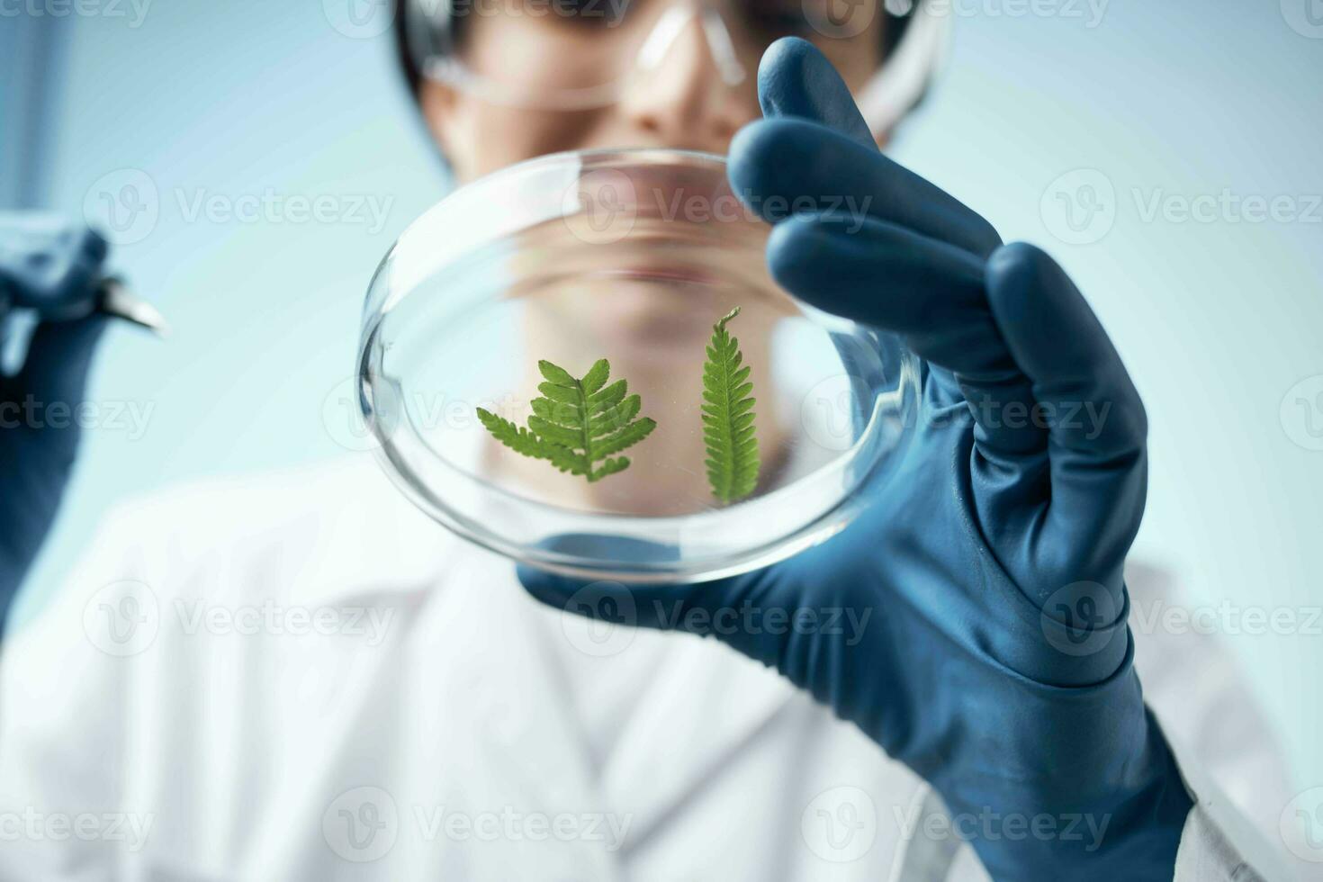 Woman in white coat biology laboratory research science photo