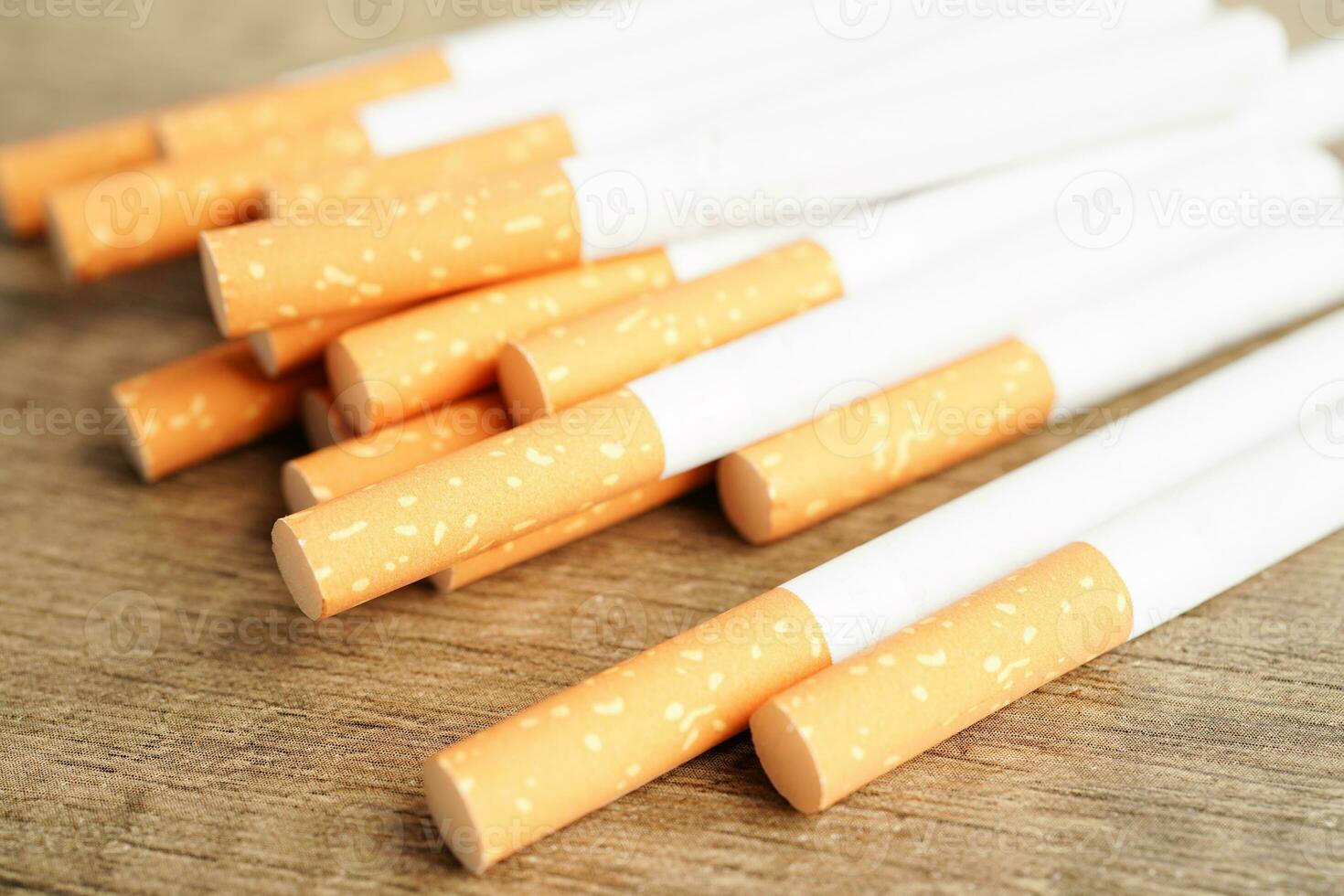 Cigarette, roll tobacco in paper with filter tube, No smoking concept. photo
