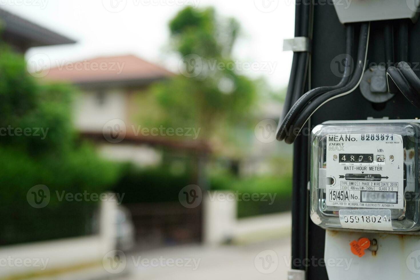Electric measuring power meter for energy cost at home and office. photo