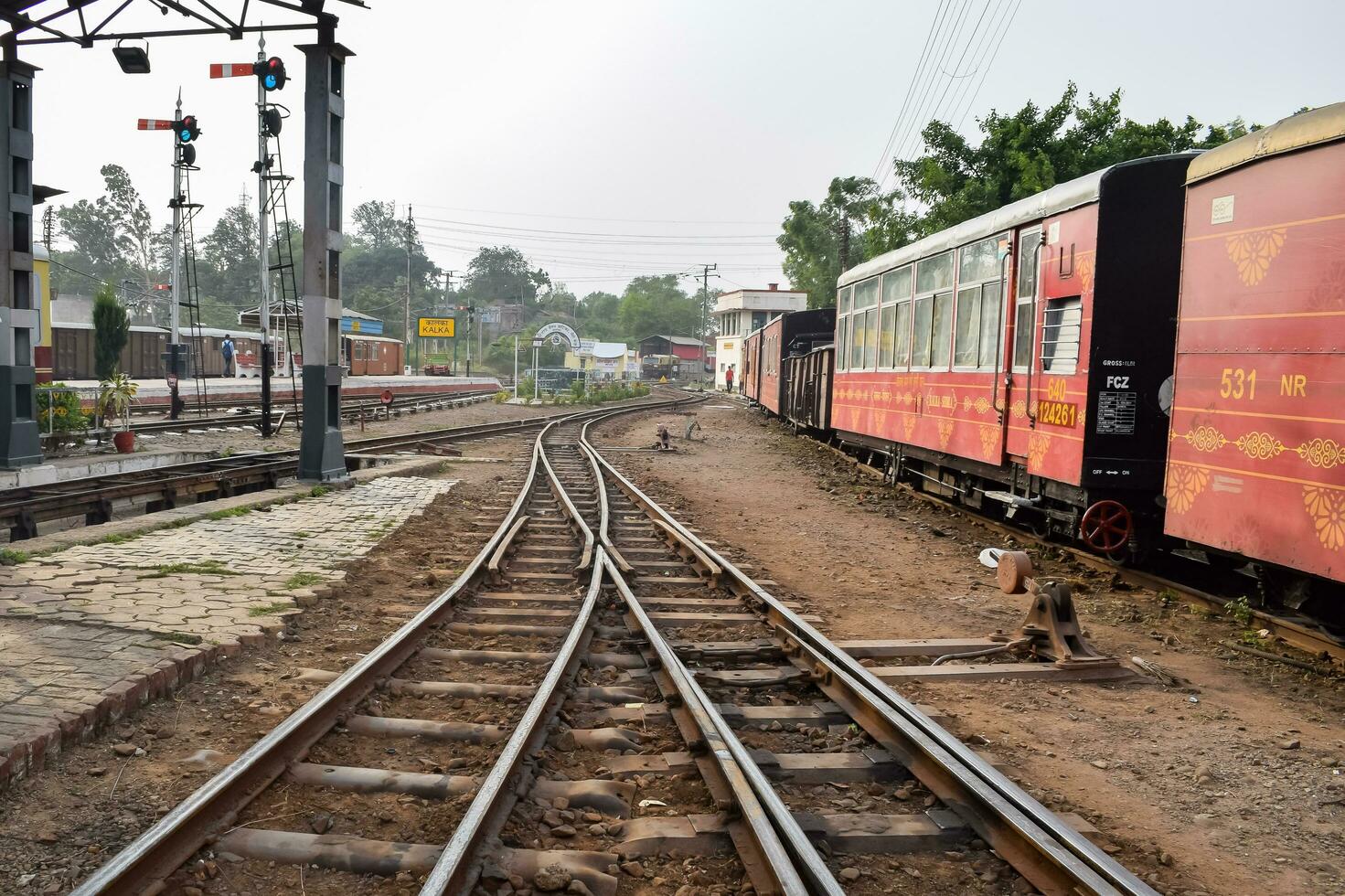 Kalka, India, March 16 2023 - View of Toy train Railway Tracks from the middle during daytime near Kalka railway station in India, Toy train track view, Indian Railway junction, Heavy industry photo