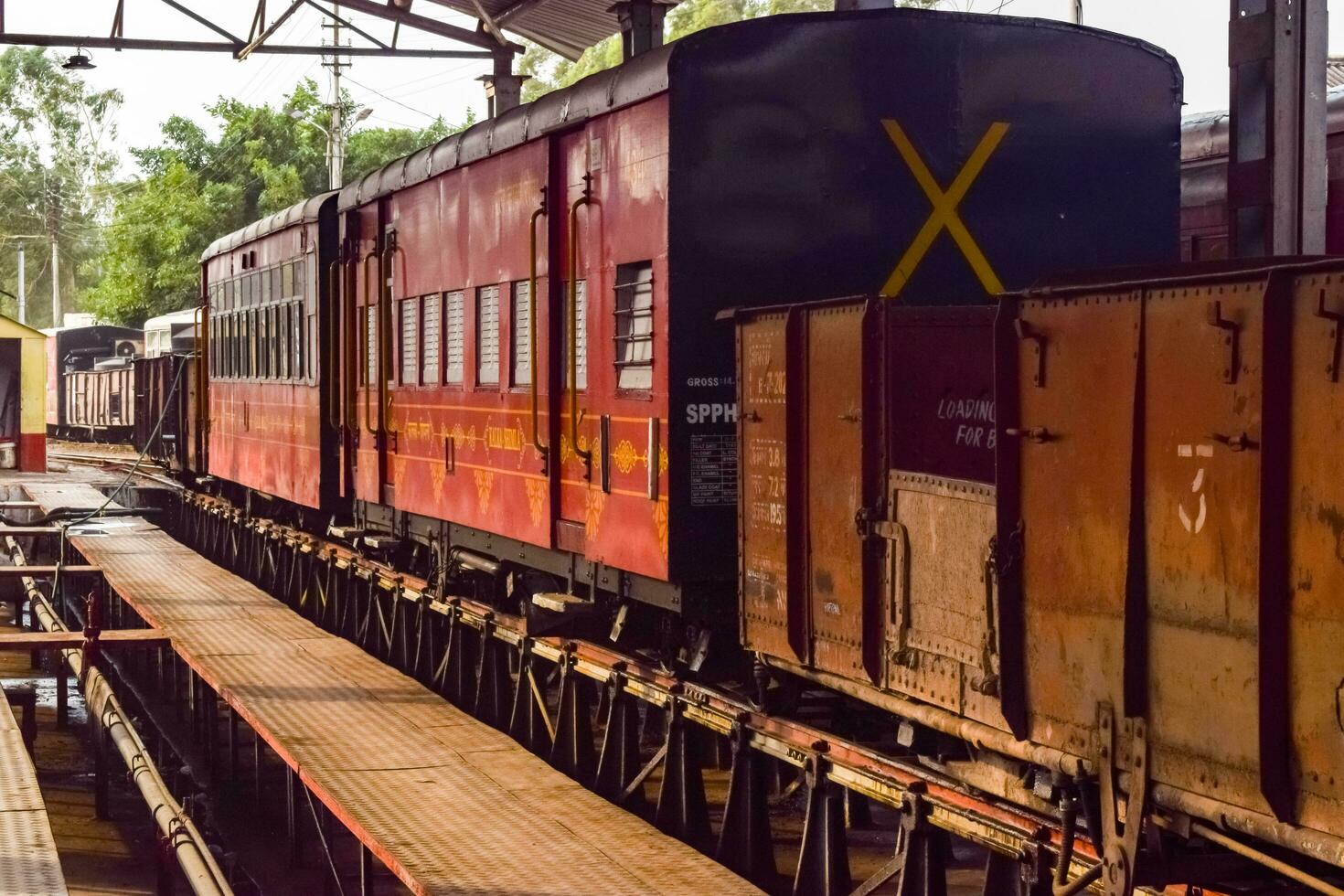 Kalka, India, March 16 2023 - View of Toy train Railway Tracks from the middle during daytime near Kalka railway station in India, Toy train track view, Indian Railway junction, Heavy industry photo