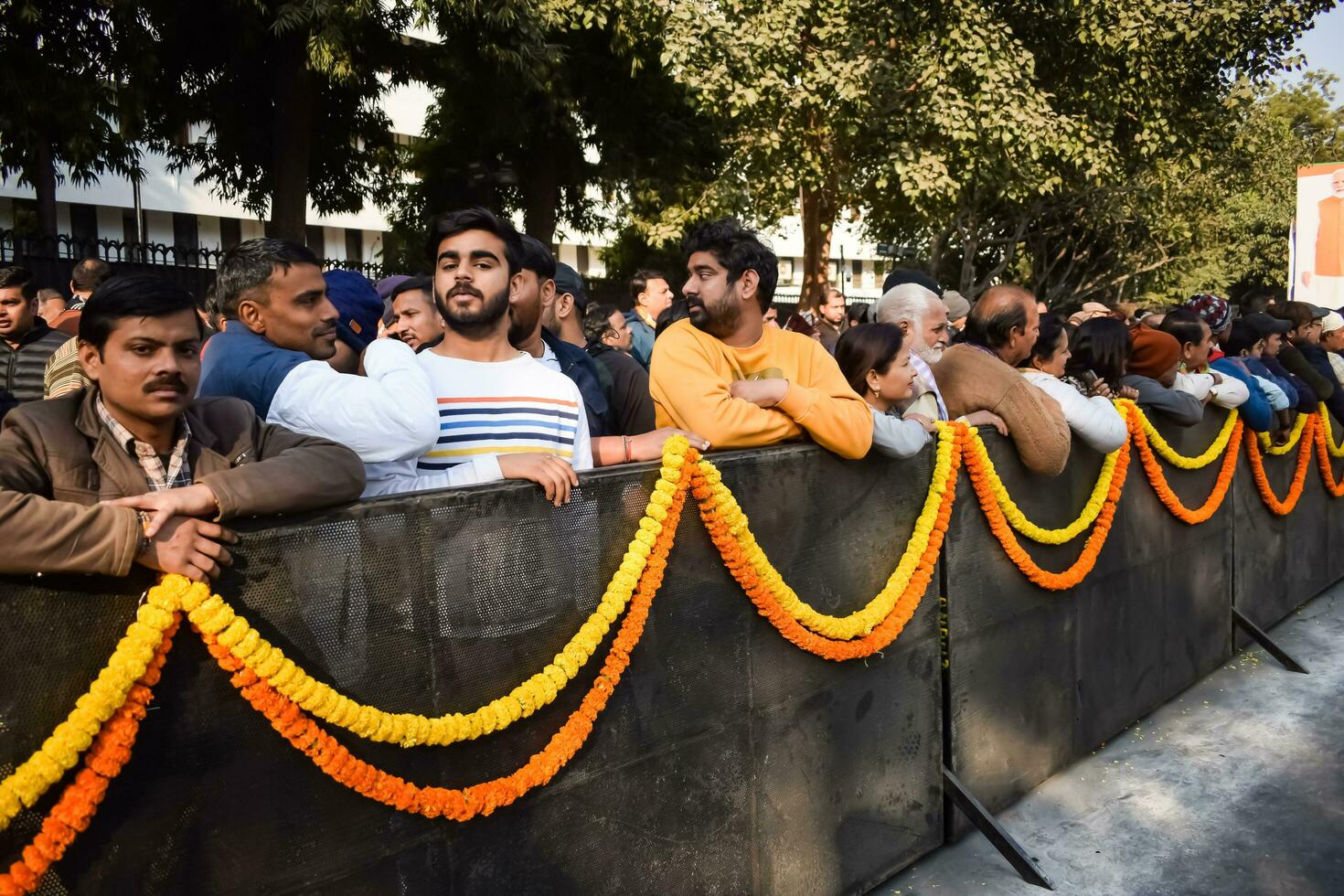 New Delhi, India - January 16 2023 - Thousands of people collected during Prime Minister Narendra Modi BJP road show, people during PM Modi big election rally in the capital photo