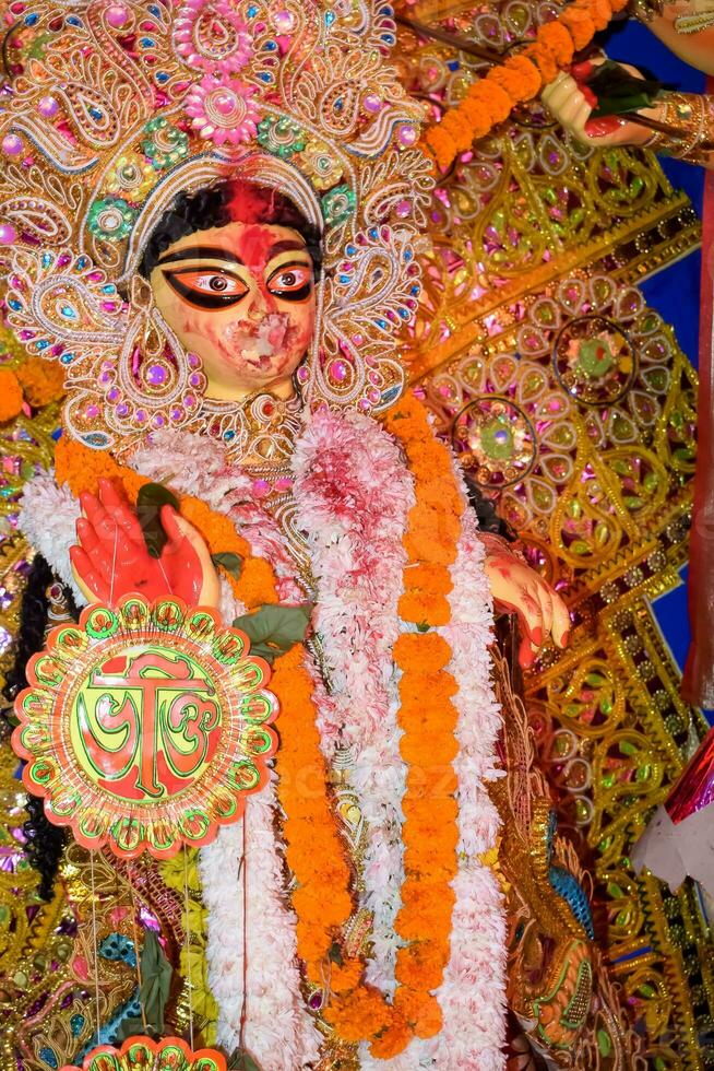 Goddess Durga with traditional look in close up view at a South Kolkata Durga Puja, Durga Puja Idol, A biggest Hindu Navratri festival in India photo