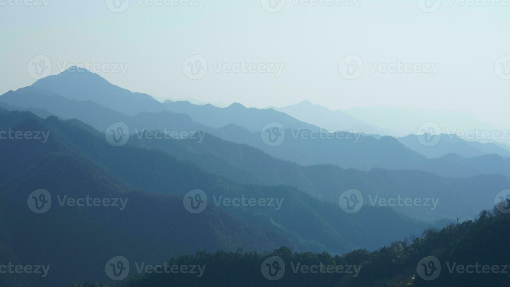 The beautiful mountains view from the top of the hill in spring photo