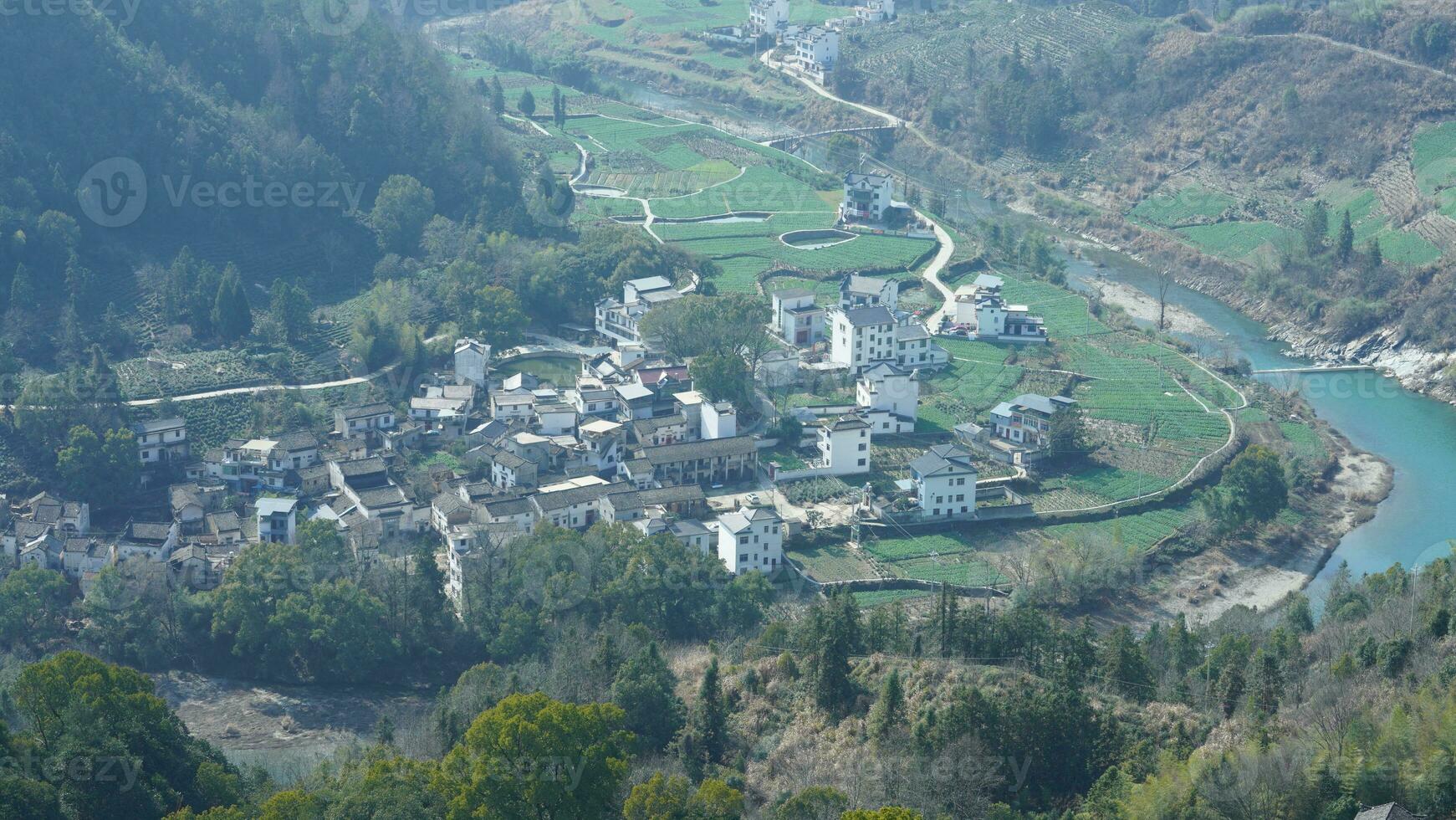 The mountains and valley view with the river running through them in spring photo